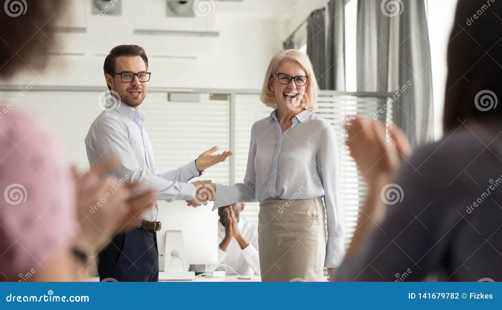 happy manager boss praising old employee get team appreciation