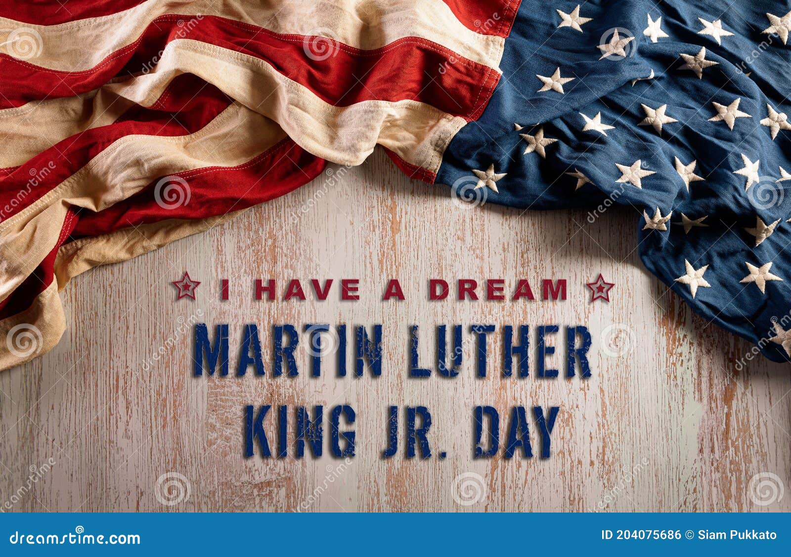 happy martin luther king day concept.  american flag againt old wooden background