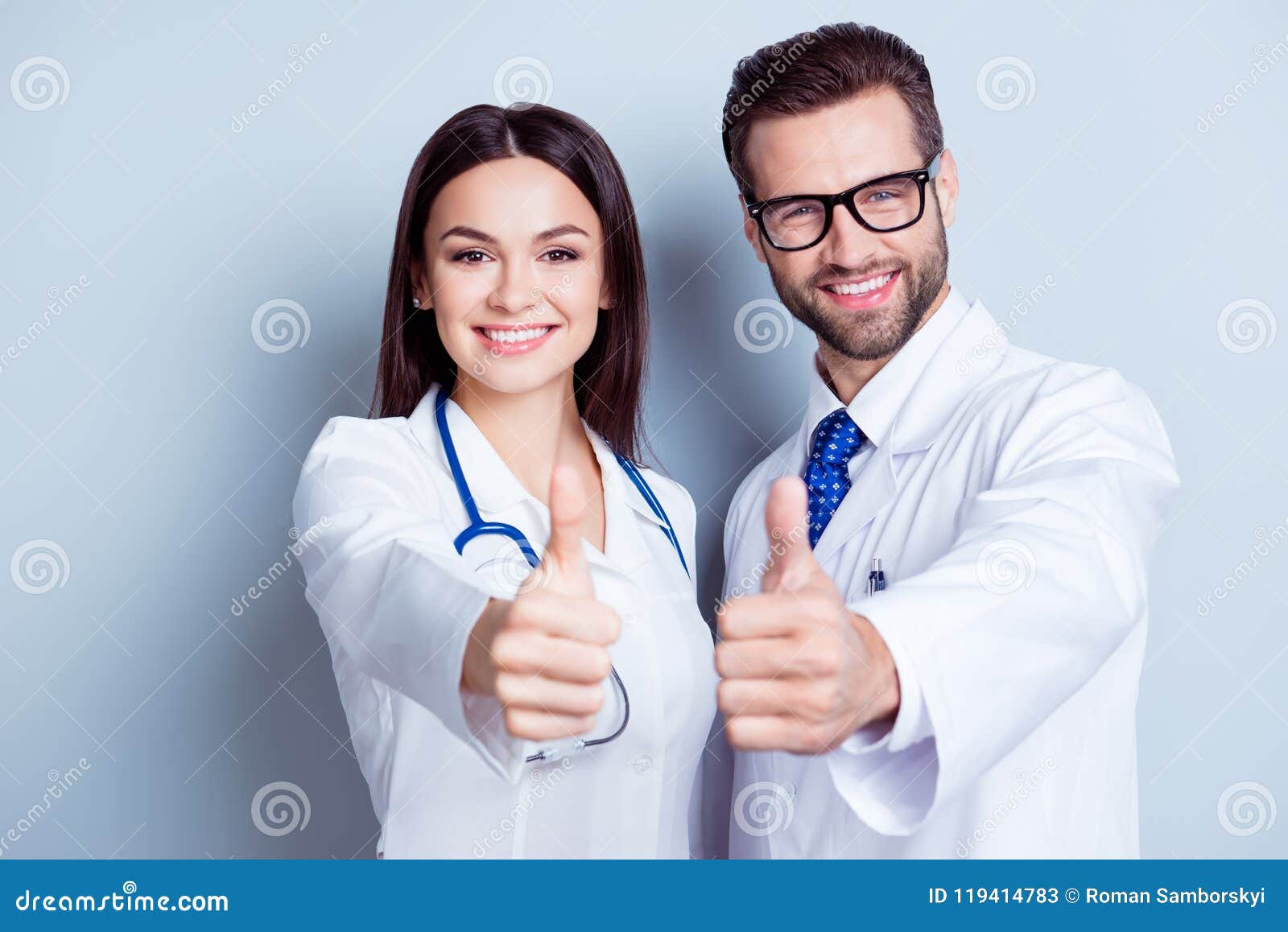 happy medic workers. portrait of two doctors in white coats and