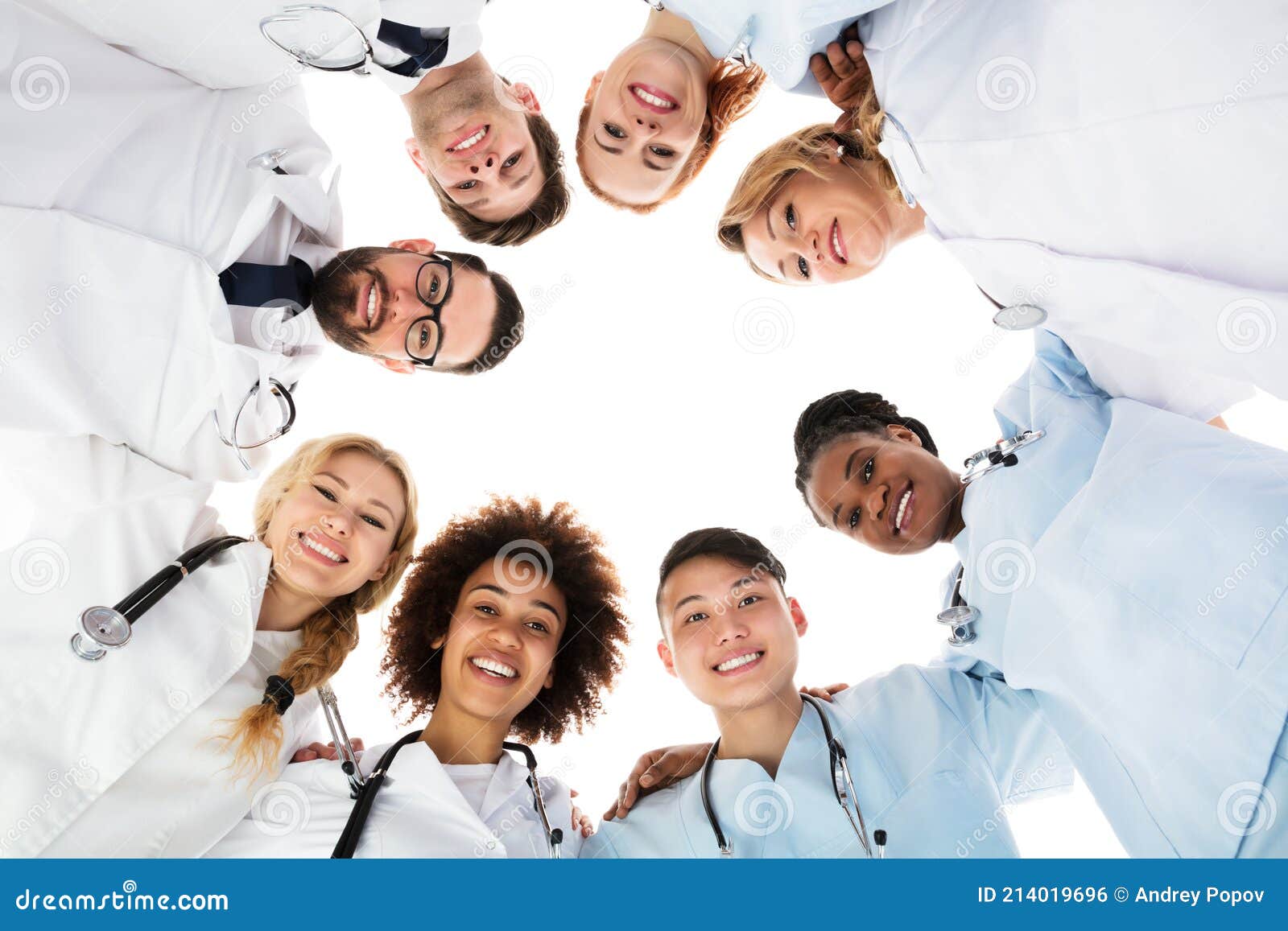 Happy Medical Team Forming Huddle Stock Photo Image of asian, clinic