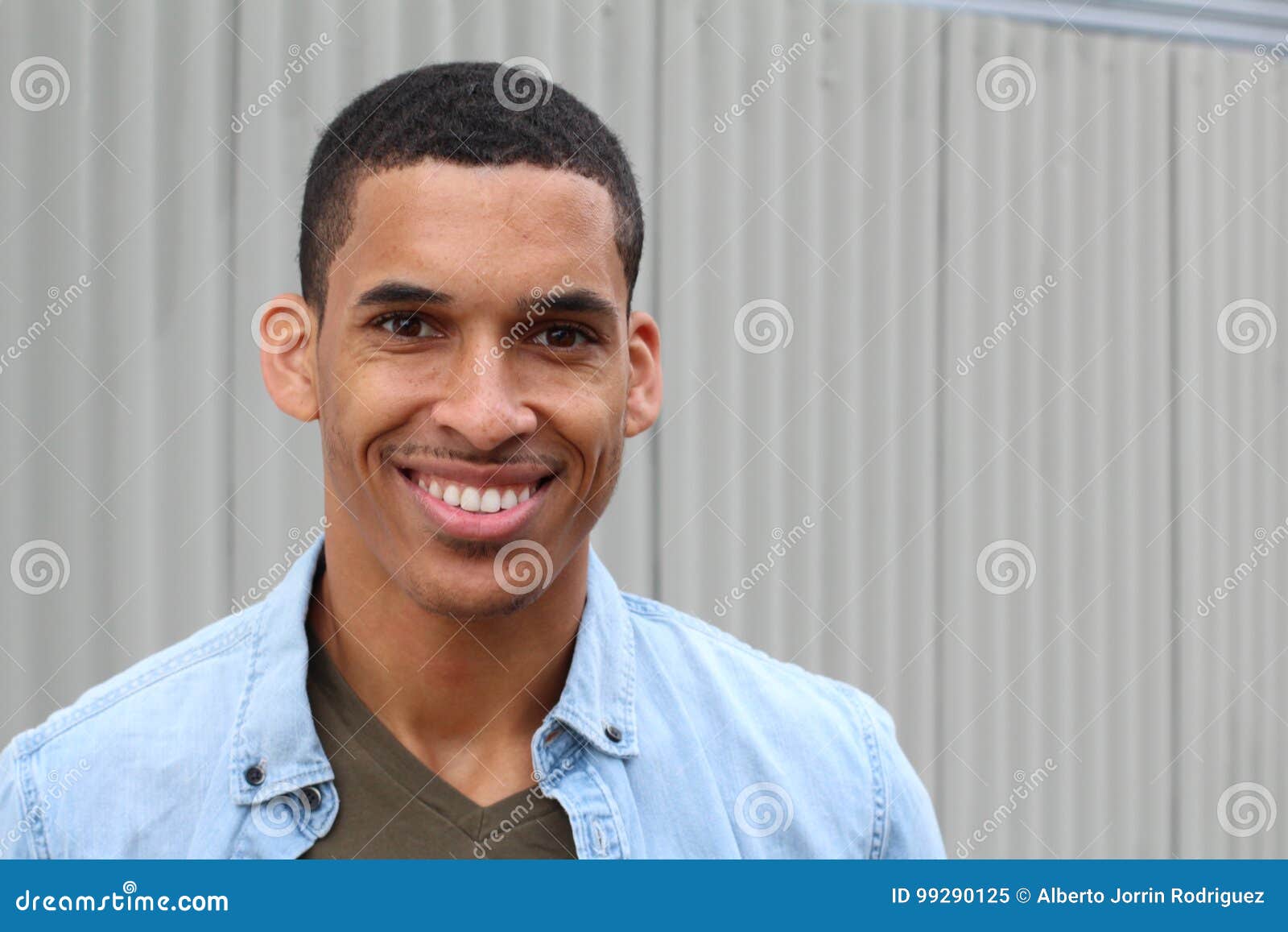 happy-mixed-race-male-smiling-portrait-copy-space-happy-mixed-race-male-smiling-portrait-copy-space-99290125.jpg