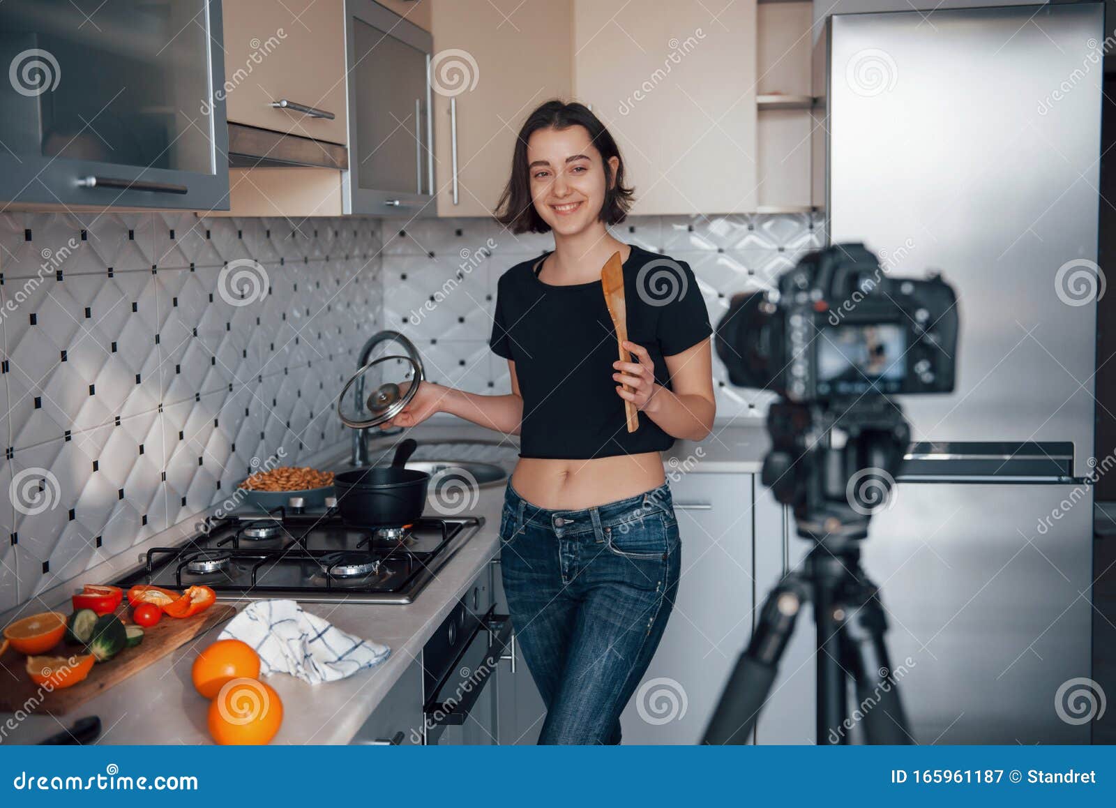 Happy Model Making Food Girl In The Modern Kitchen At Home At Her 