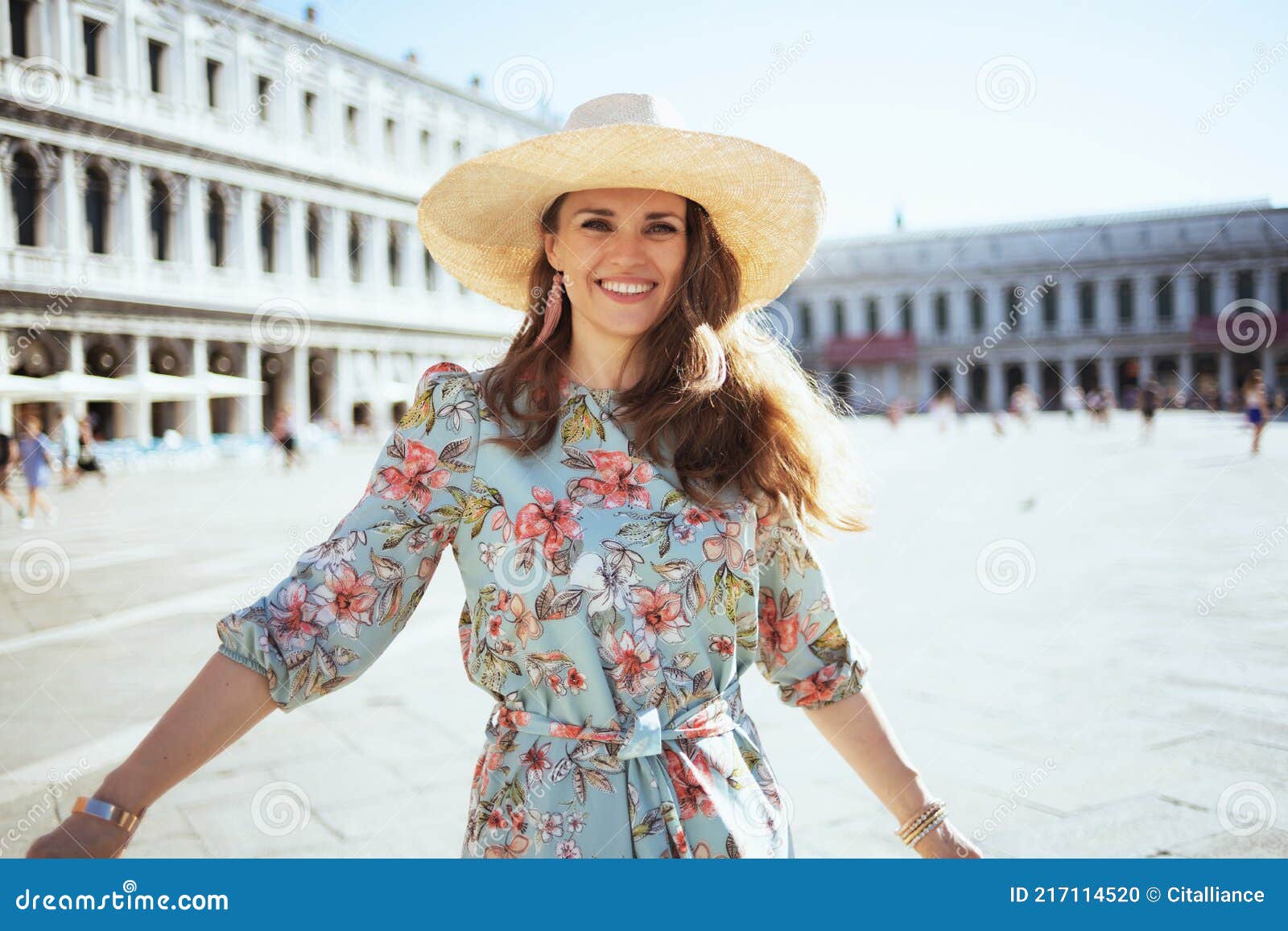 happy modern woman in floral dress exploring attractions