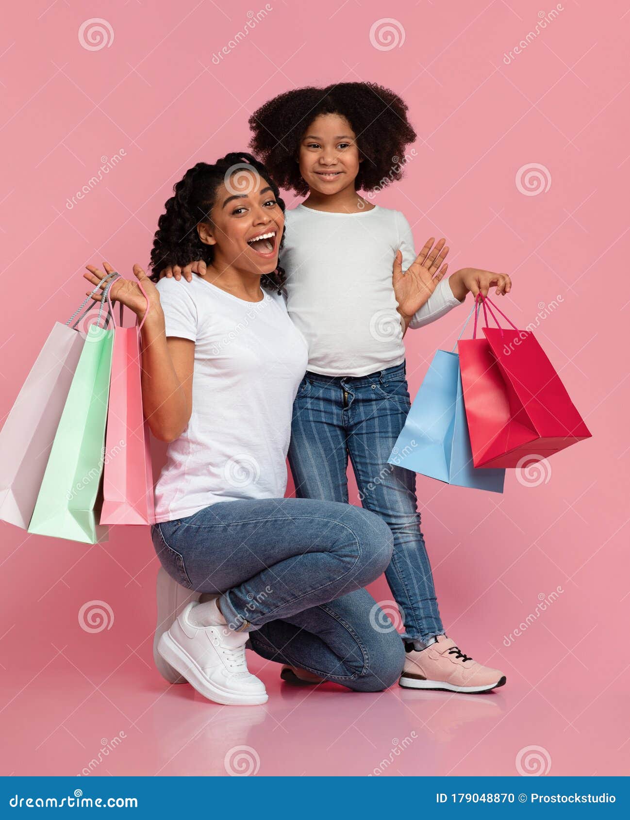 Happy Mom and Daughter Standing with Lot of Paper Shopping Bags Stock ...