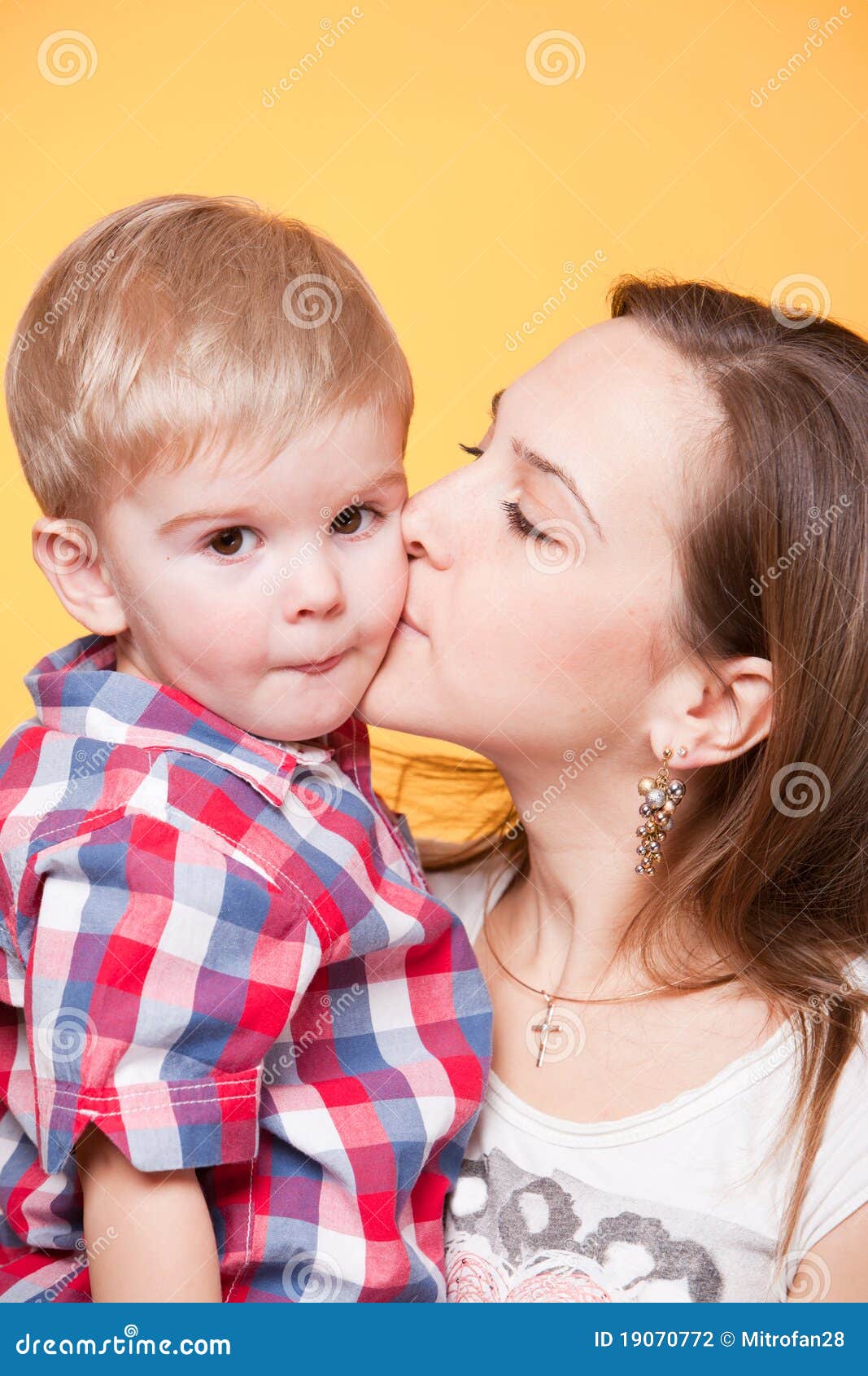 Happy Mom Kissing Little Son Stock Photo - Image of funny ...