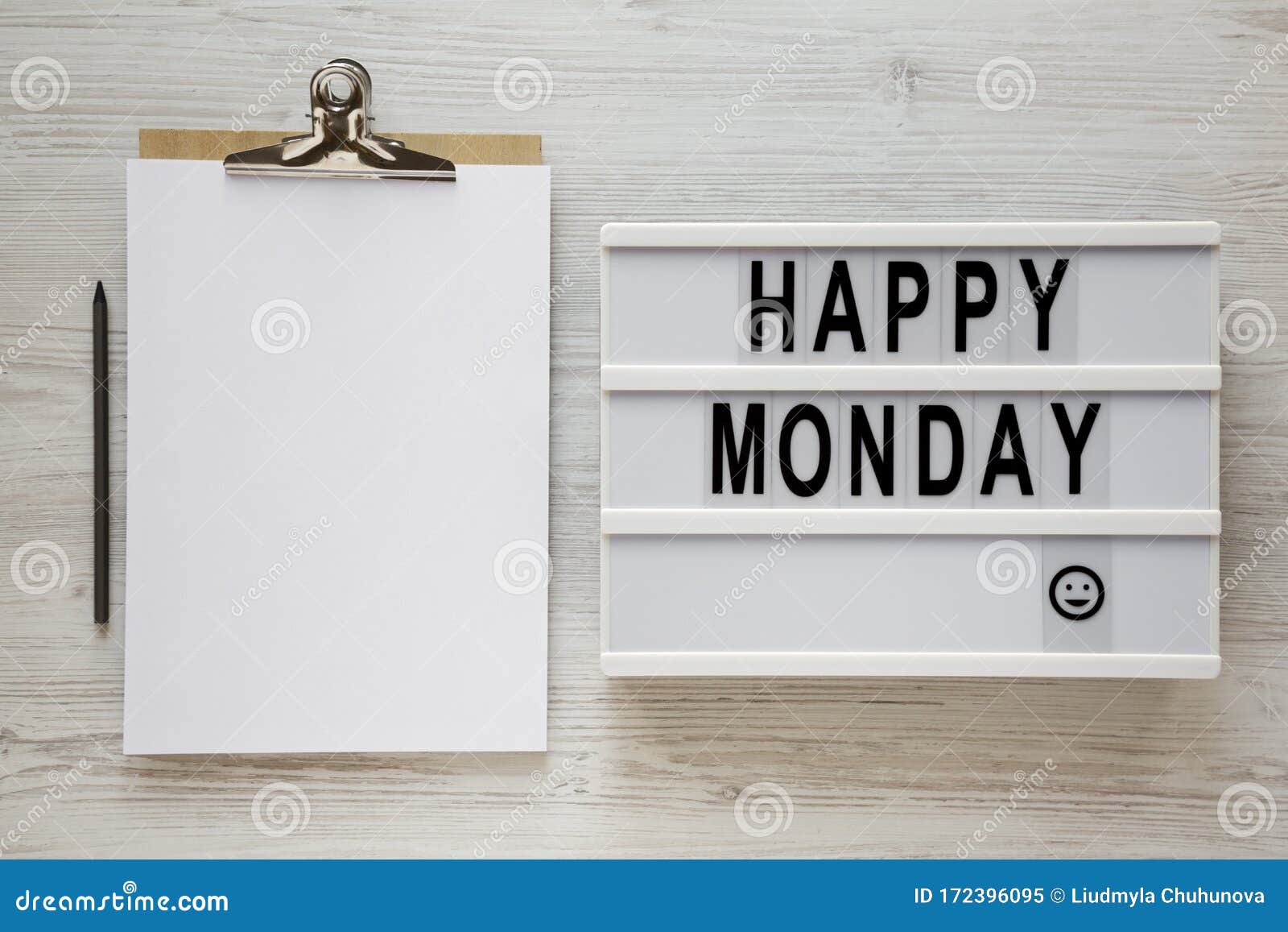 `Happy Monday` Words on a Lightbox, Clipboard with Blank Sheet of Paper ...