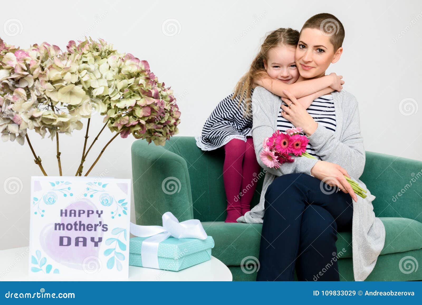 happy mother`s day. cute little girl congratulating mom to mothers day. mother and daughter.