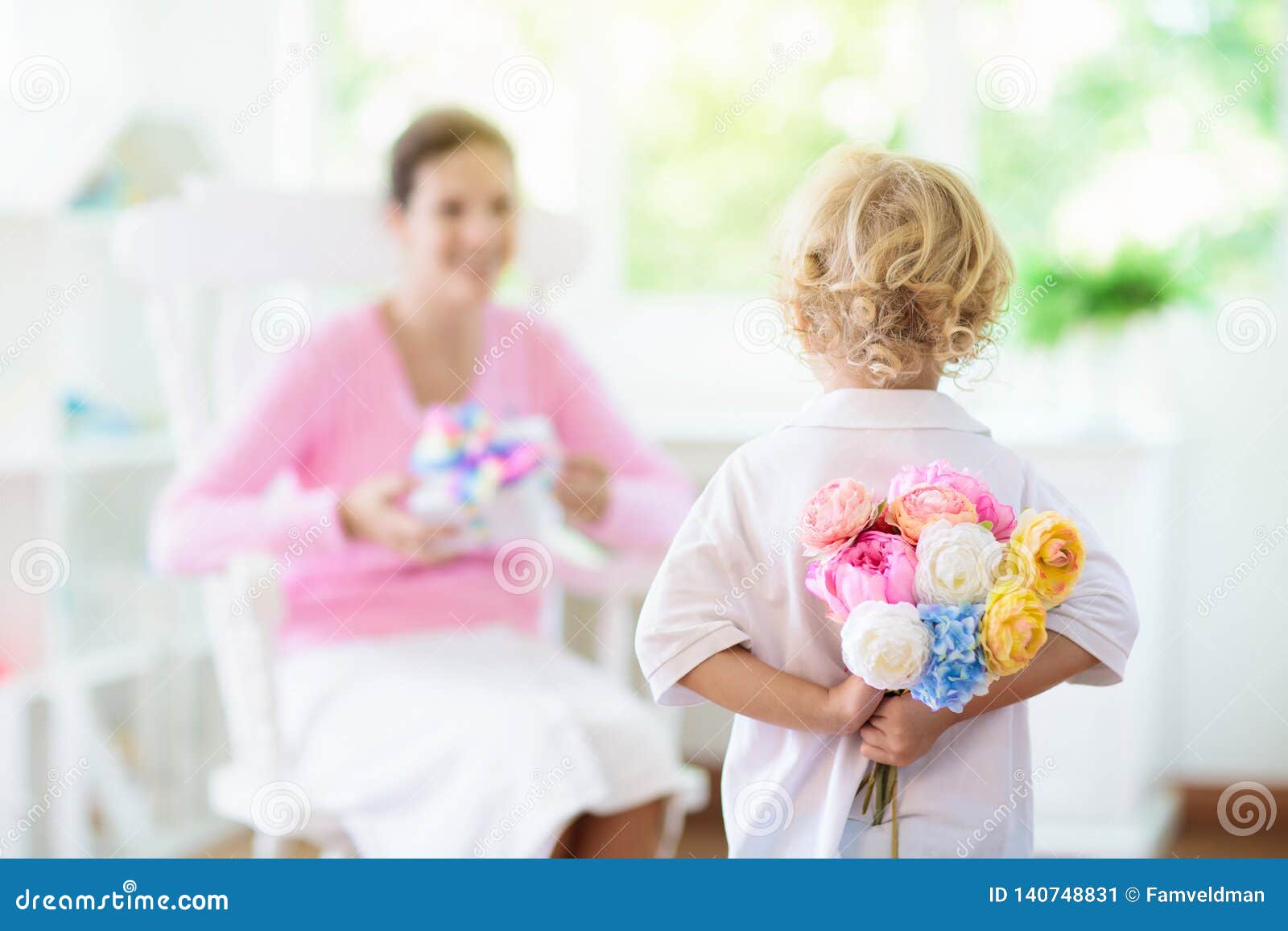 happy mothers day. child with present for mom