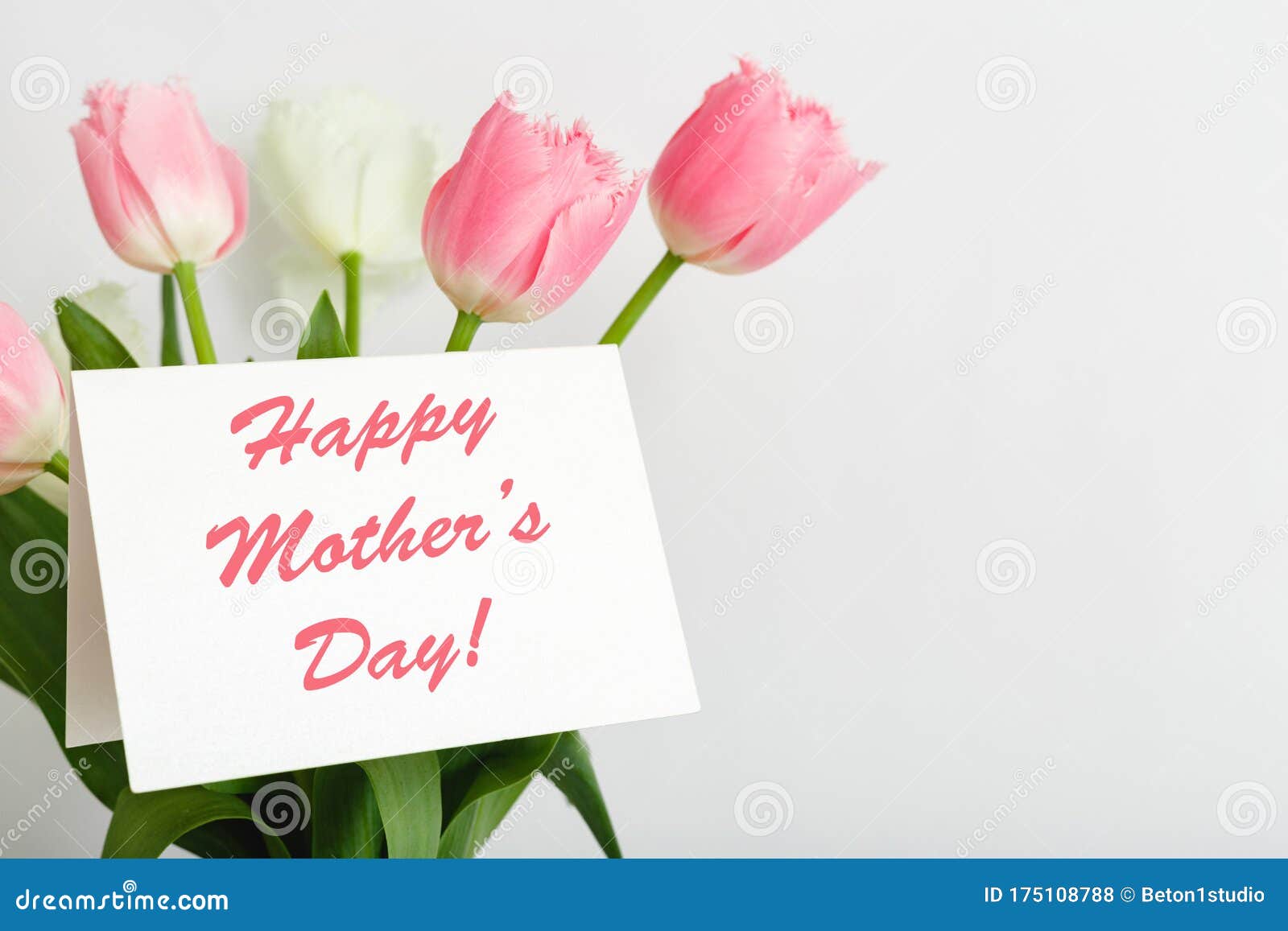 Happy Mothers Day Text On Gift Card In Flower Bouquet On