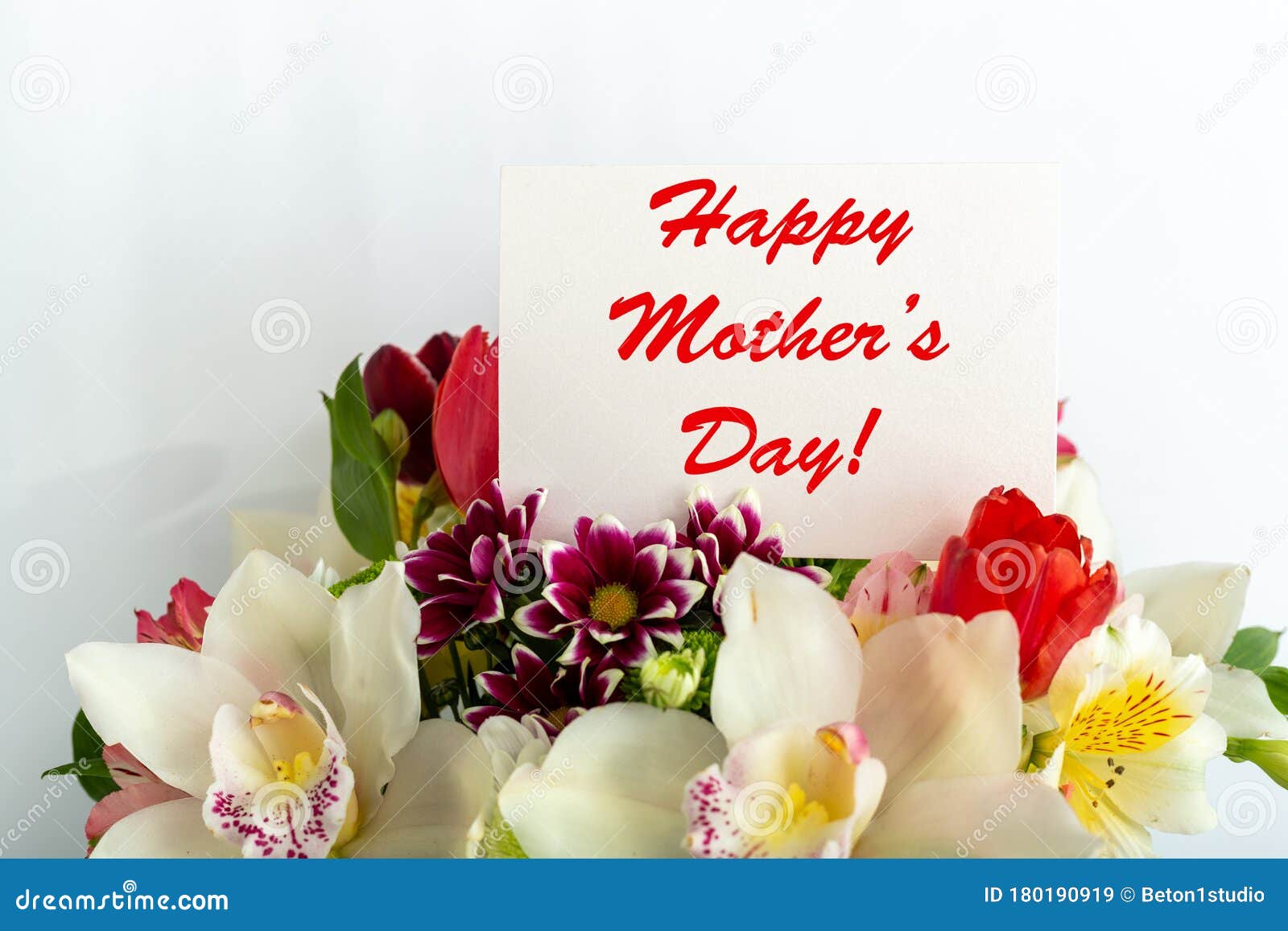 Happy Mothers Day Text On Gift Card In Flower Bouquet On