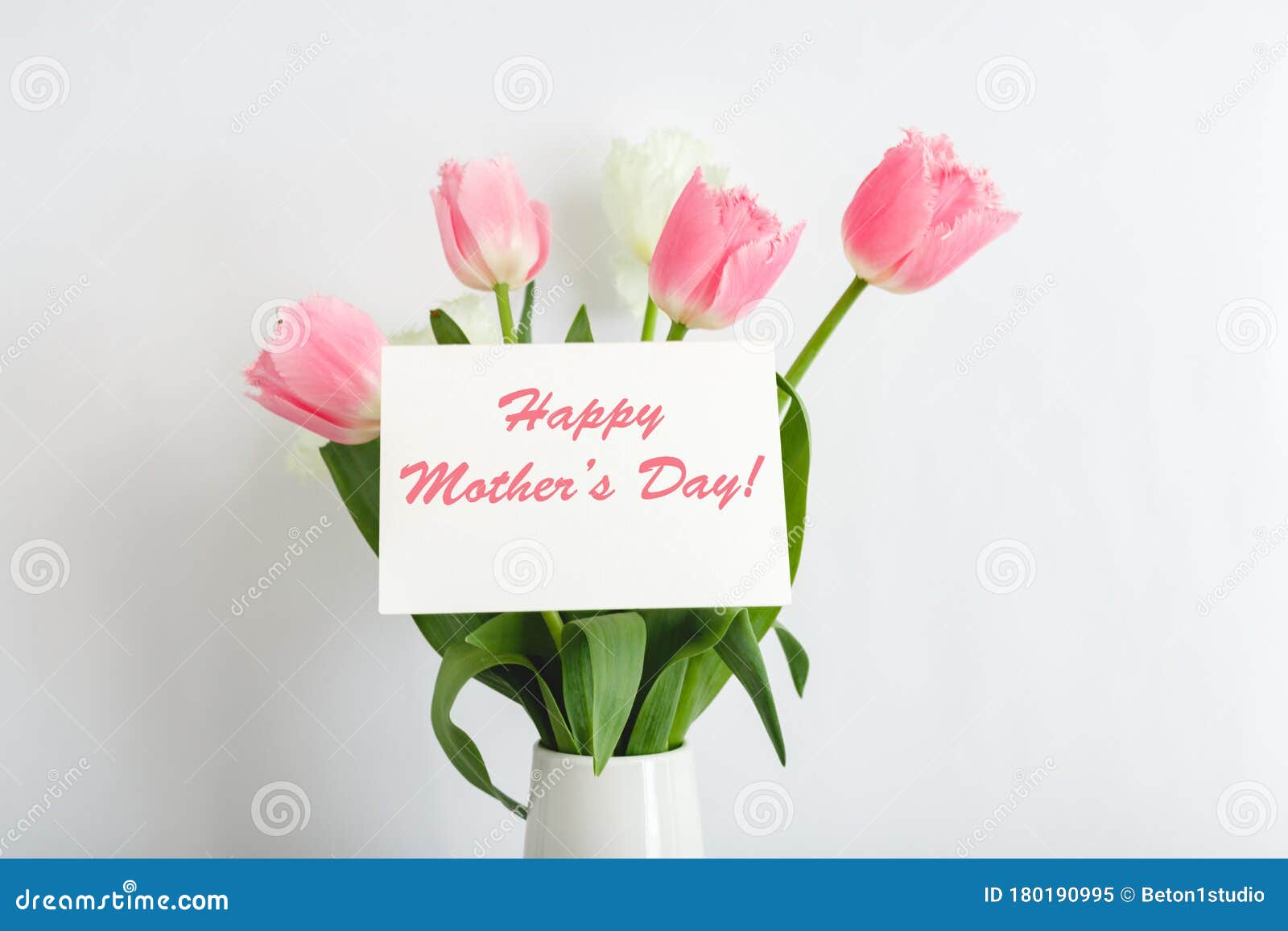 Happy Mothers Day Text On Gift Card In Flower Bouquet On