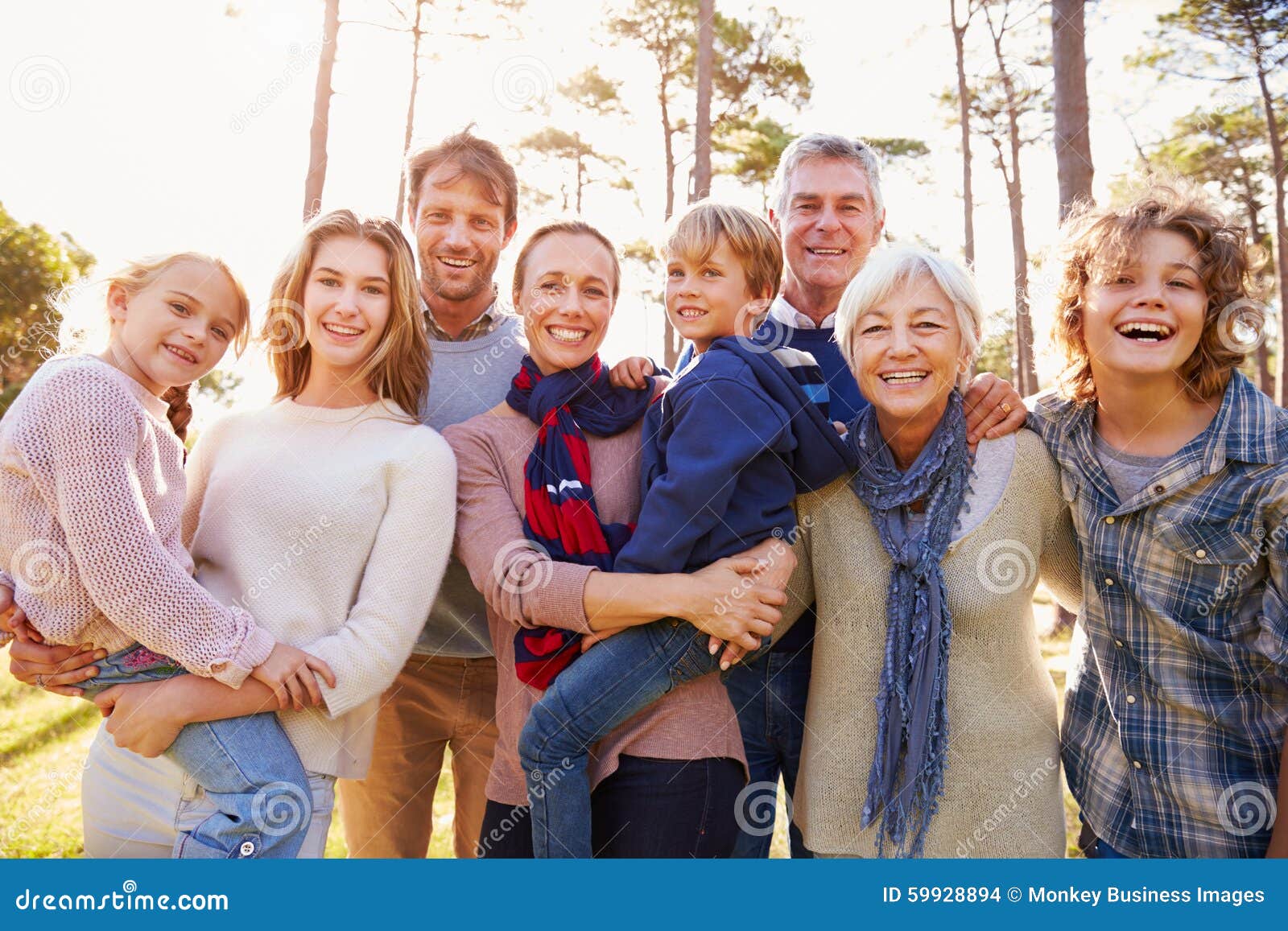 happy multi-generation family portrait in the countryside