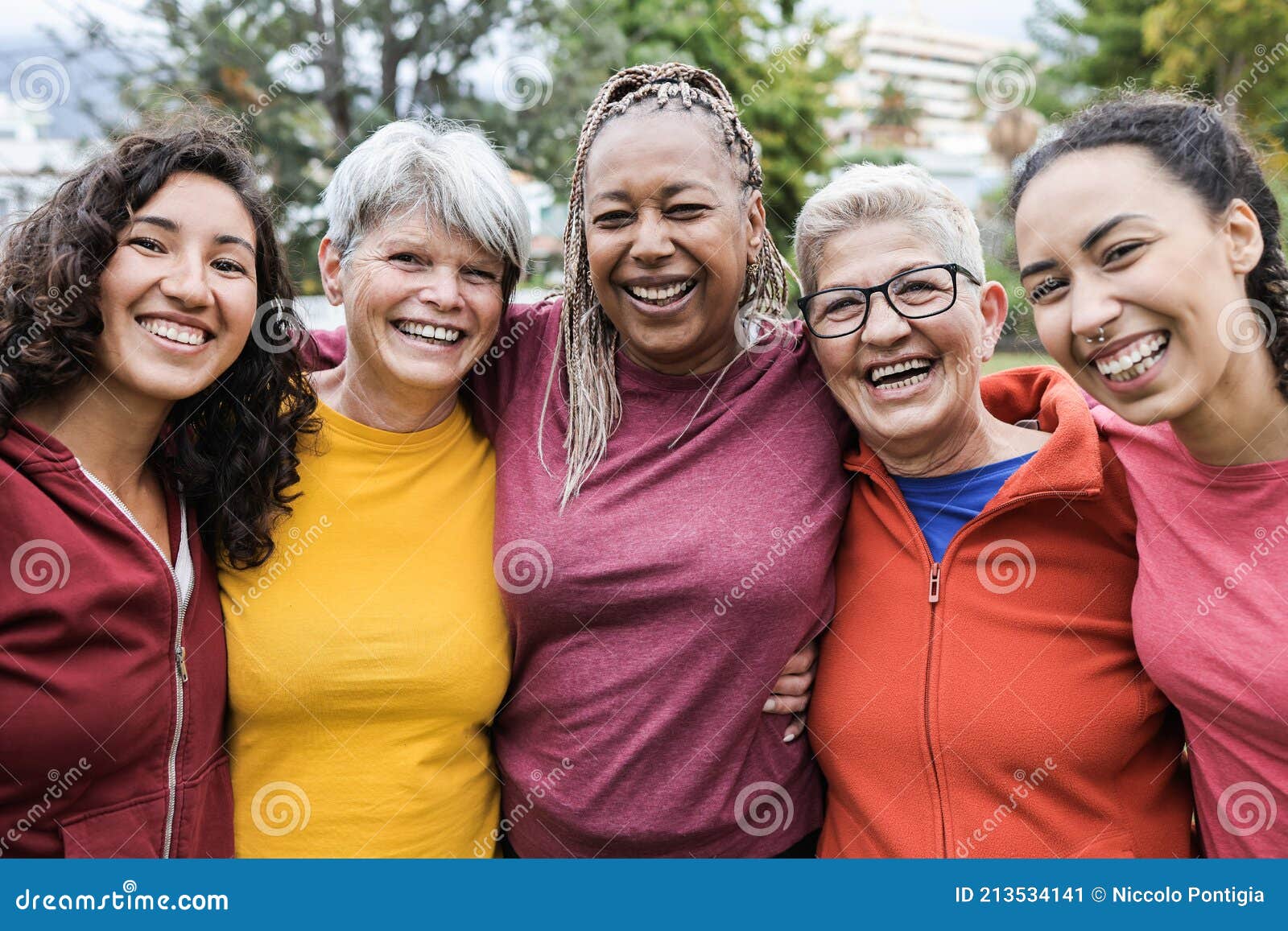 happy multi generational women having fun together - multiracial friends smiling on camera after sport workout outdoor - main
