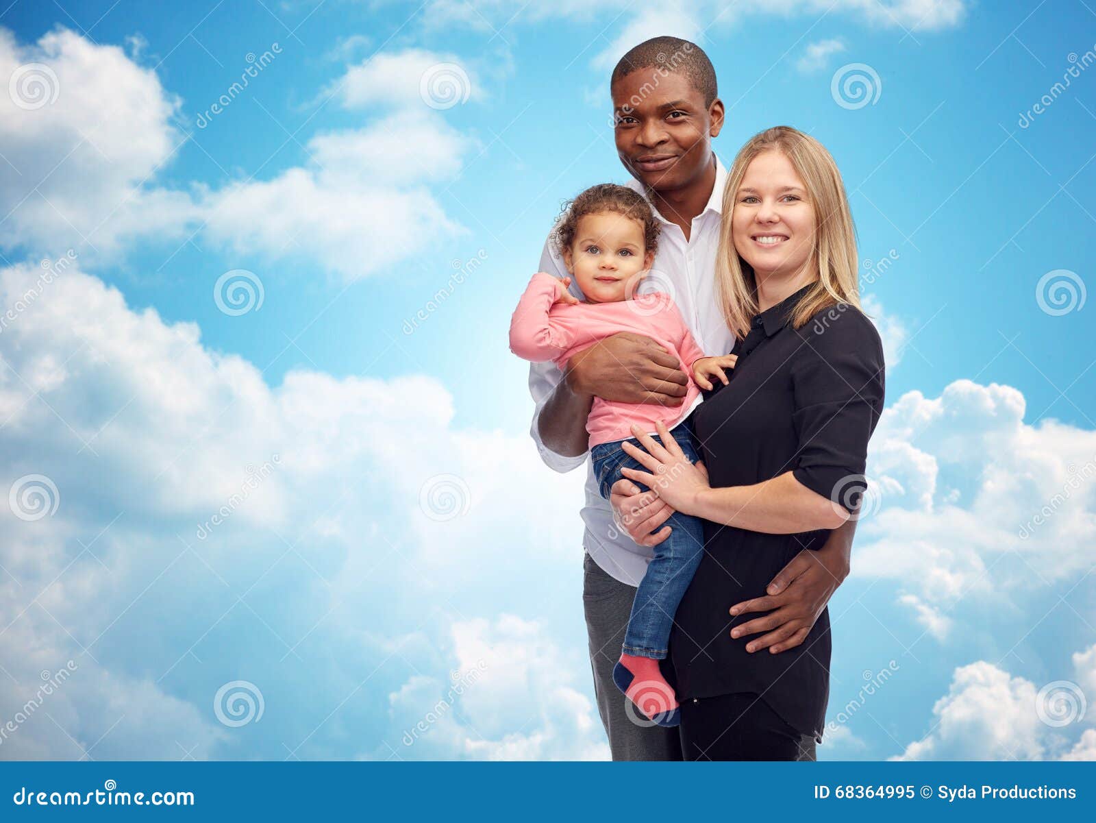 happy multiracial family with little child