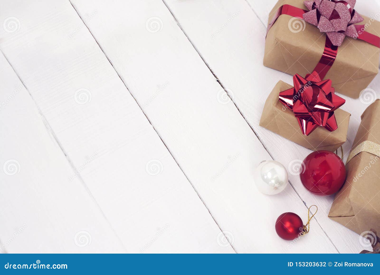happy new year 2020 christmastime. gift boxes and christmas tree toys on background. winter light rustic photo