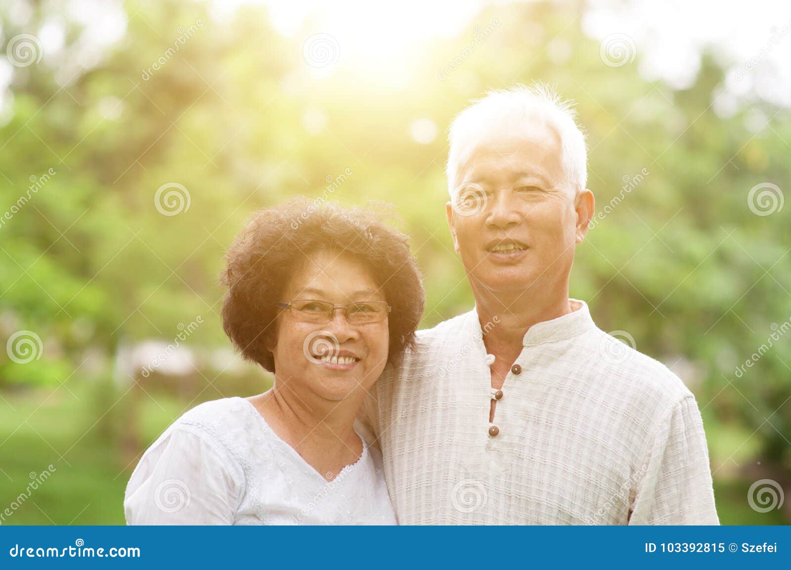 elderly asian couple - Asian elderly couple talking at home ...