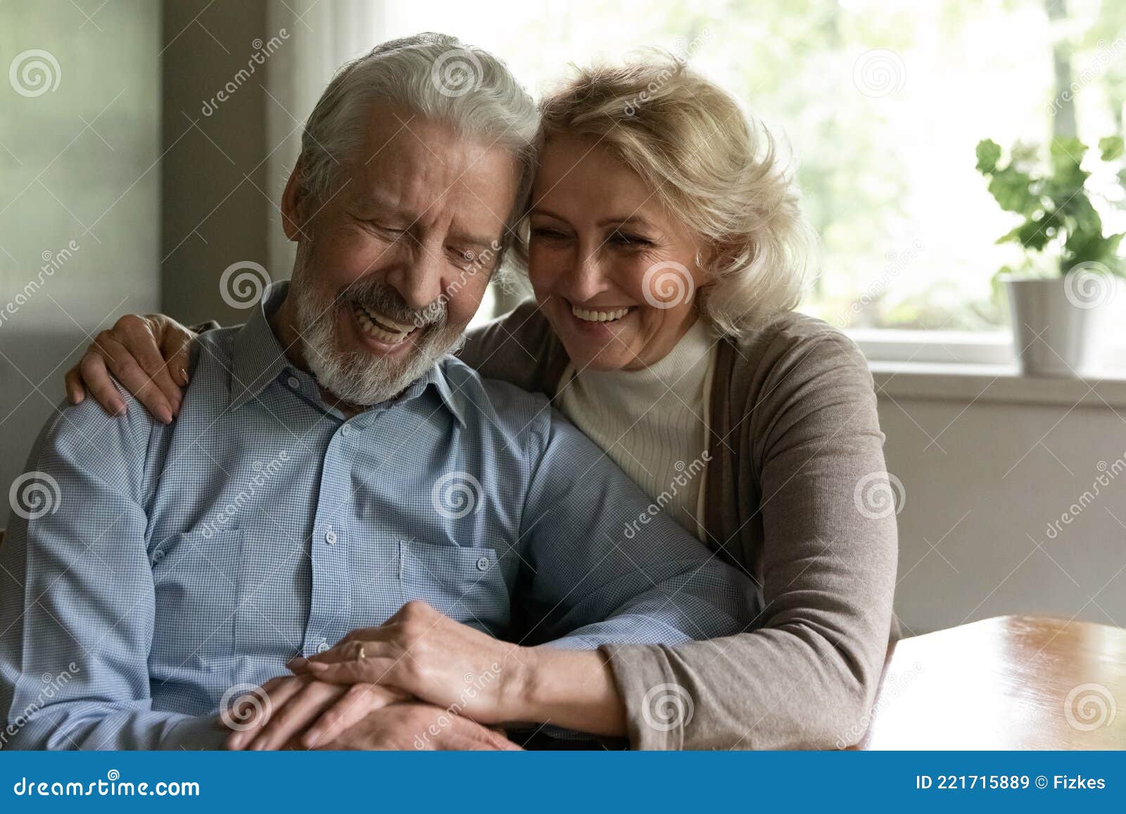 happy old couple enjoy maturity together at home