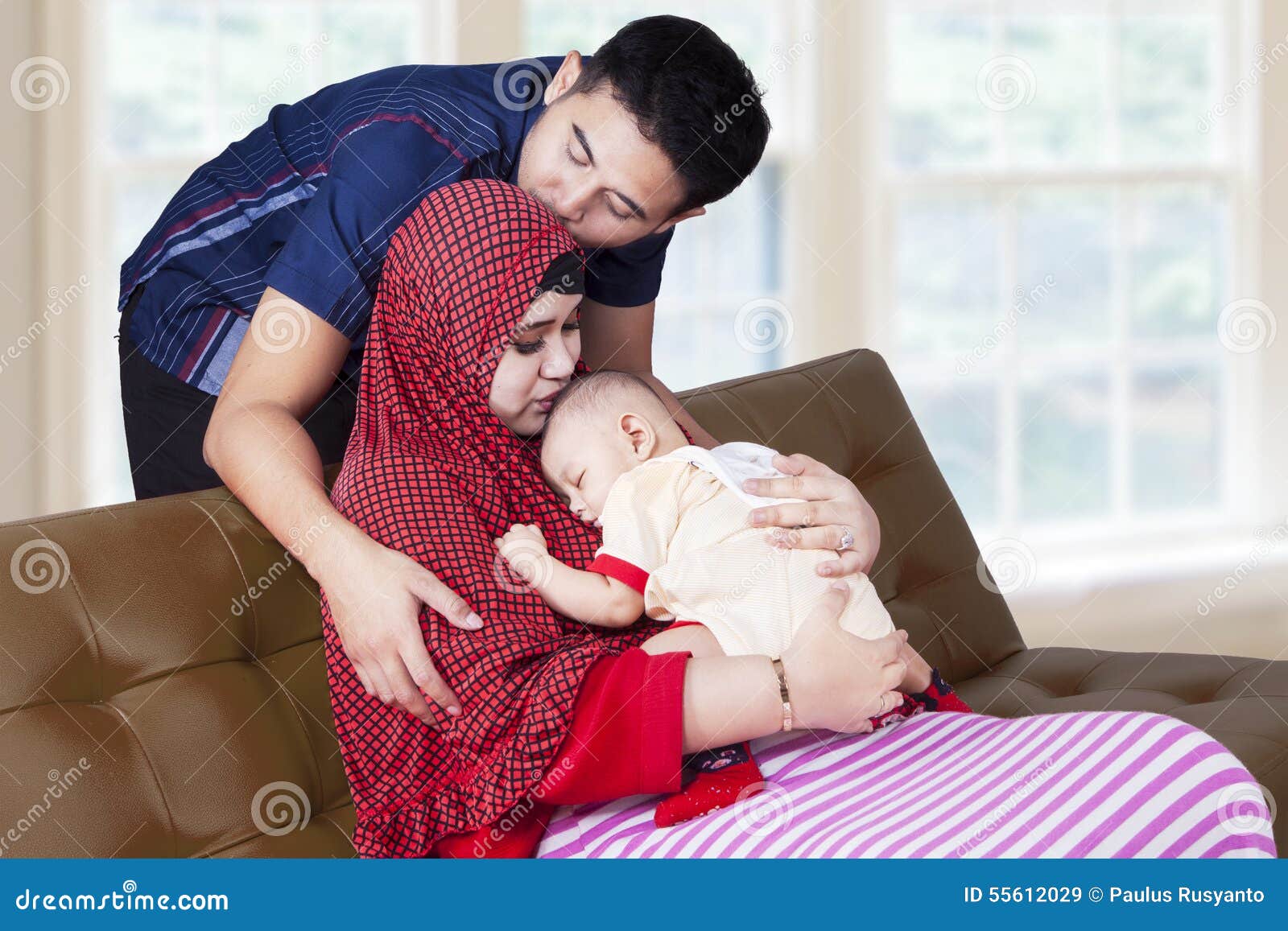 Happy Parents with Baby Boy Stock Image - Image of motherhood, islam:  55612029