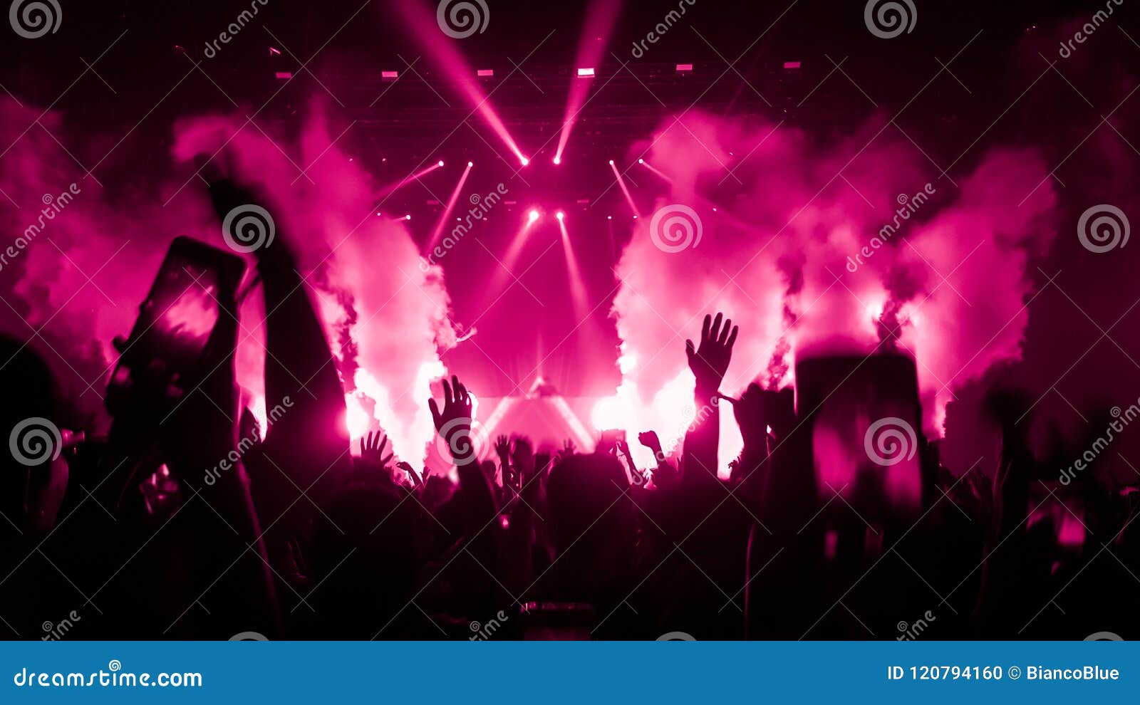 happy people dance in nightclub party concert