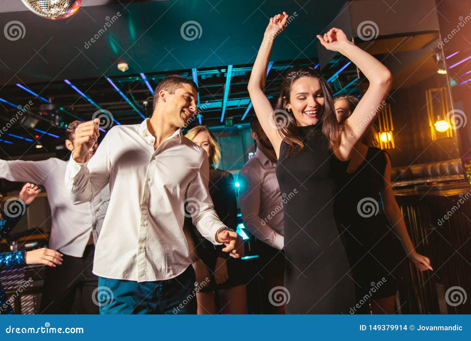 Happy People Are Dancing In Club. Nightlife And Disco Concept Stock ...