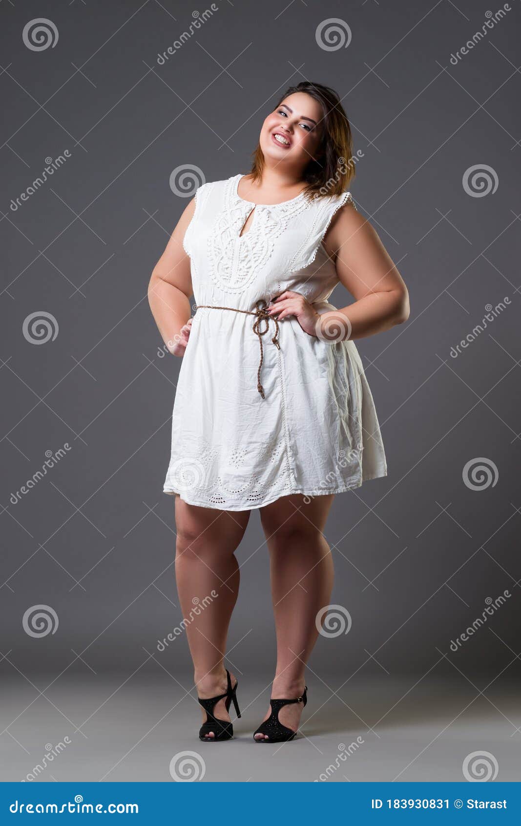 Happy Plus Size Fashion Model in Casual Clothes, Fat Woman on Gray ...