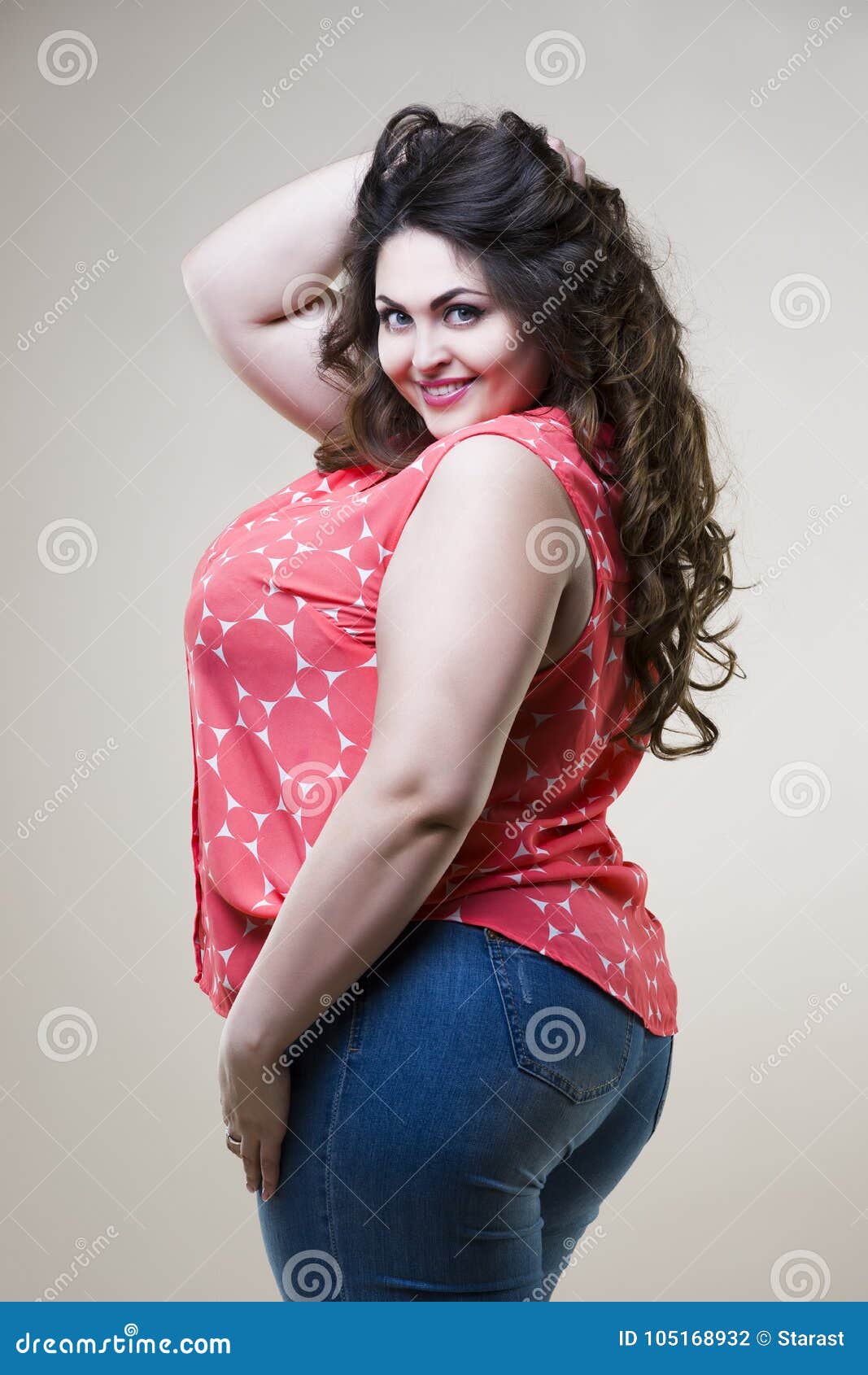 Happy Plus Size Fashion Model, Fat Woman on Beige Background Stock