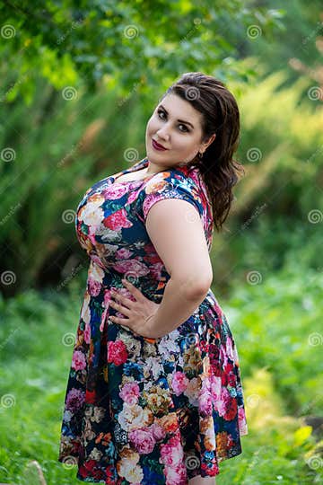 Happy Plus Size Fashion Model in Floral Dress Outdoors, Beautiful Fat ...