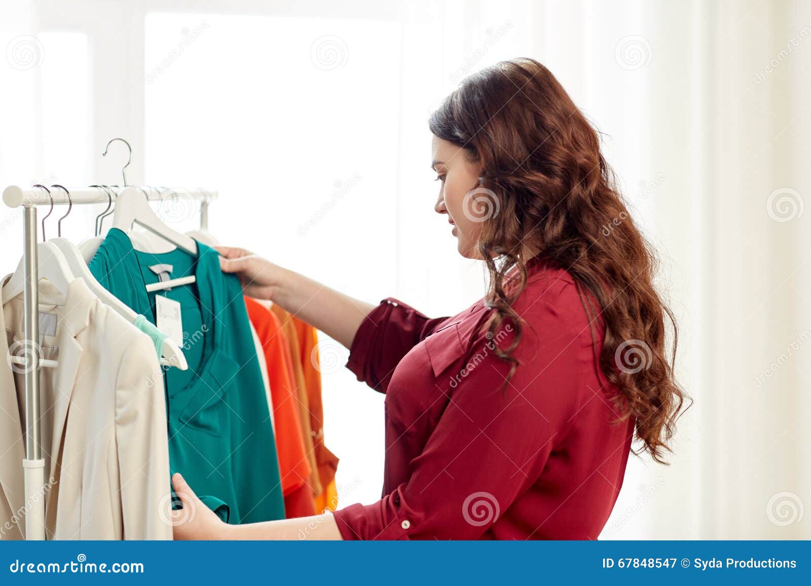 Happy Plus Size Woman Choosing Clothes at Wardrobe Stock Image - Image ...