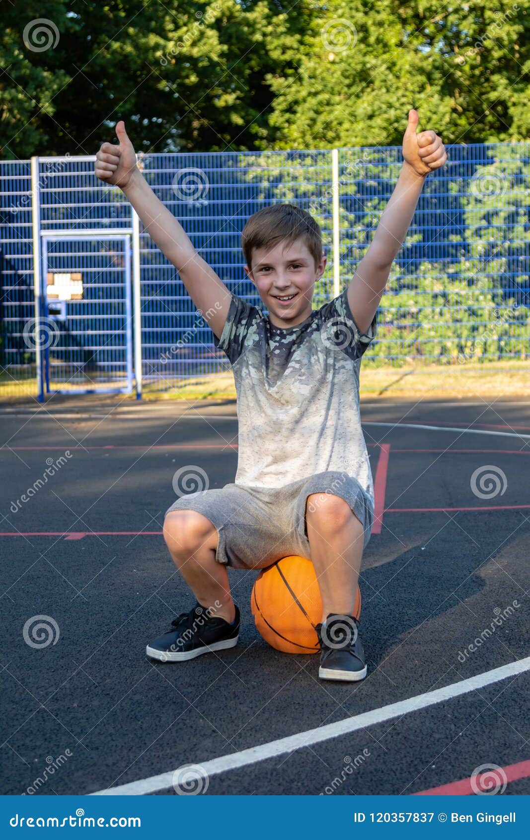 Pre-teen Caucasian Boy Playing Outside Stock Image - Image of park ...