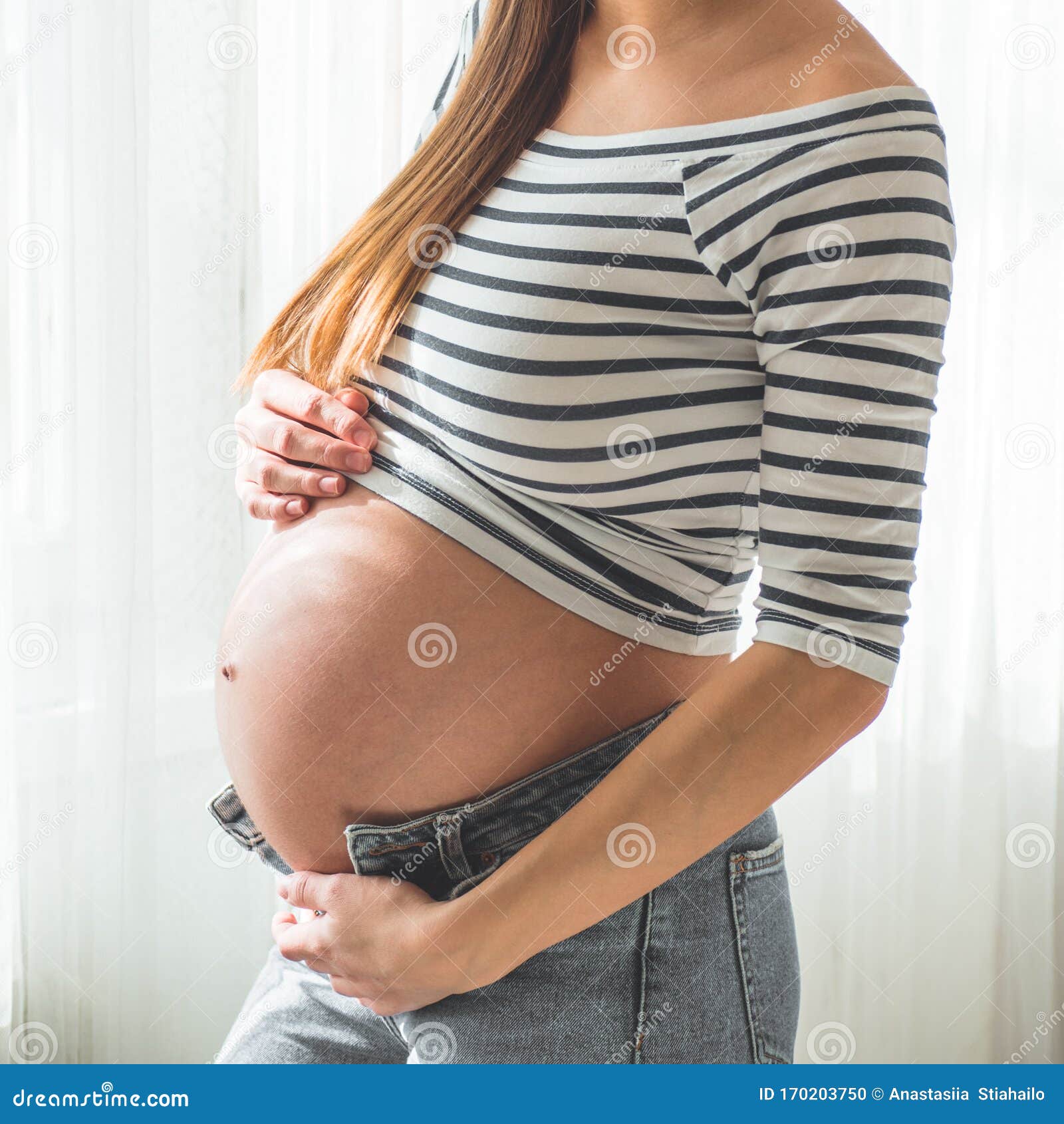 Pregnant girl with huge belly