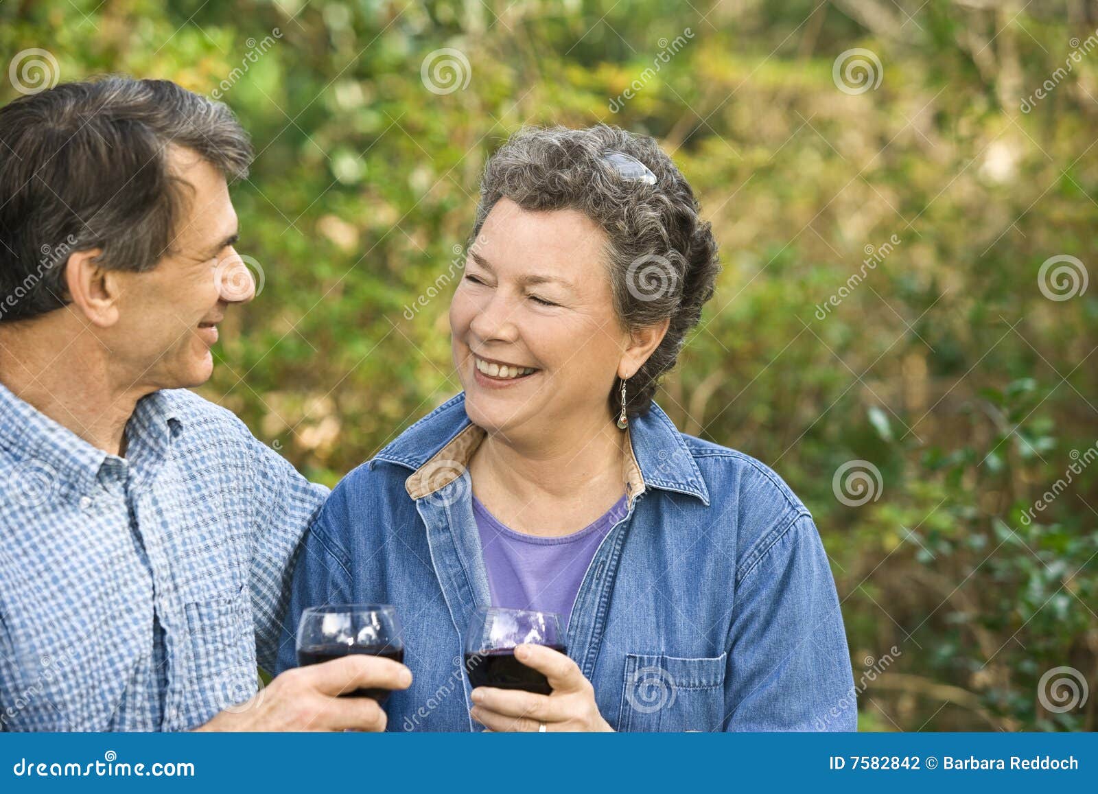 Happy Retired Couple Celebrating Stock Photo Image of expressive