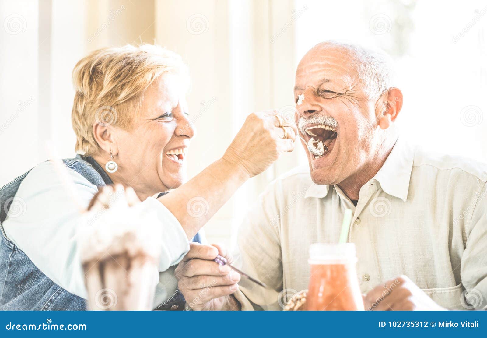 Happy Retired Senior Couple In Love Enjoying Bio Icecream Cup Stock Photo Image Of Feed Breakfast 102735312