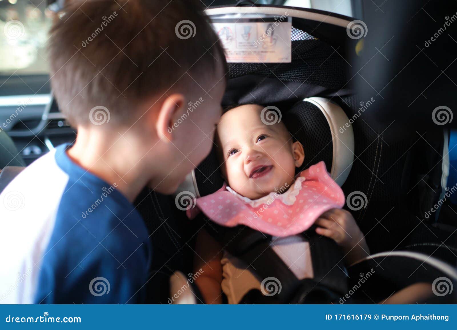 Two happy little asian kids playing outdoor in the sunny park Stock Photo -  Alamy