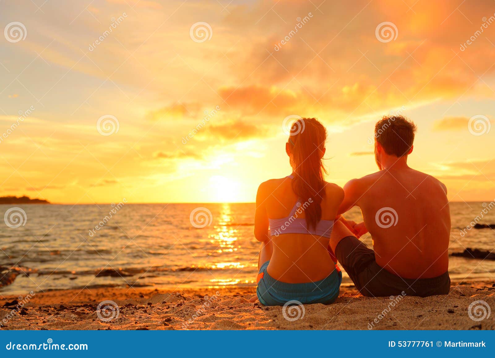 Happy Romantic Couple Enjoying Sunset At Beach Stock Image