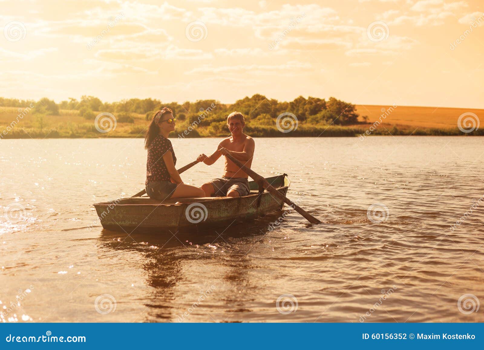 Happy Romantic Couple Rowing a Boat Stock Photo Image of intimacy