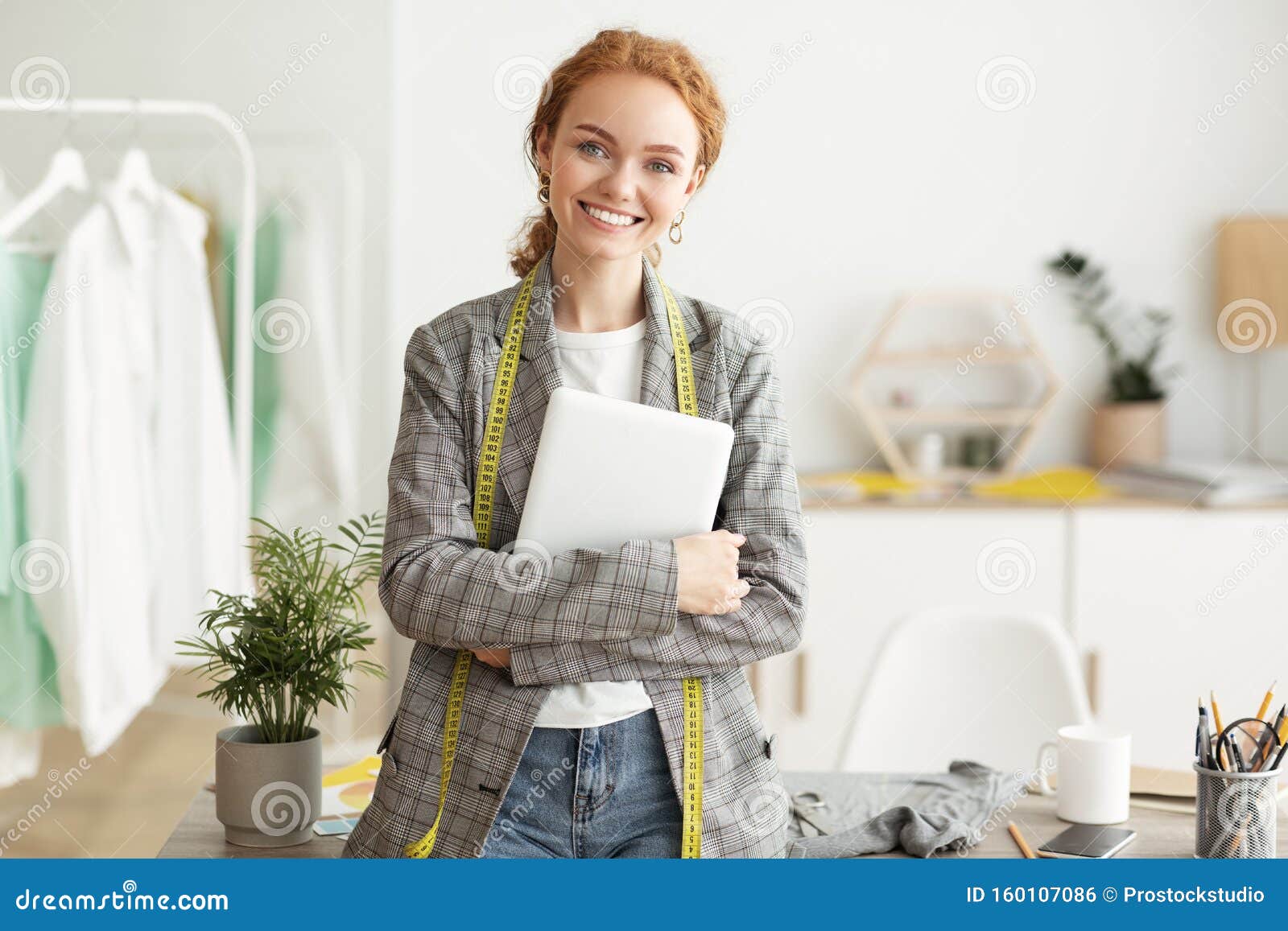 Happy Seamstress Smiling To Camera, Holding Tablet Stock Photo - Image ...