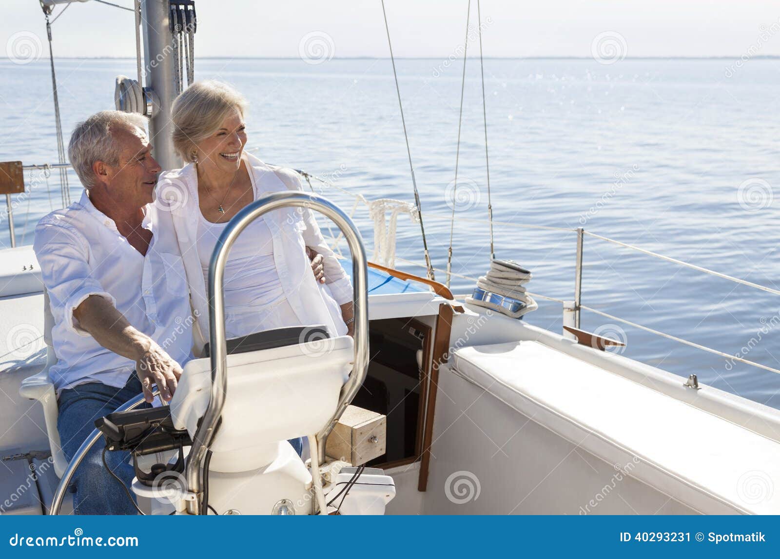 Happy Senior Couple Sailing Yacht Or Sail Boat Stock Photo - Image 