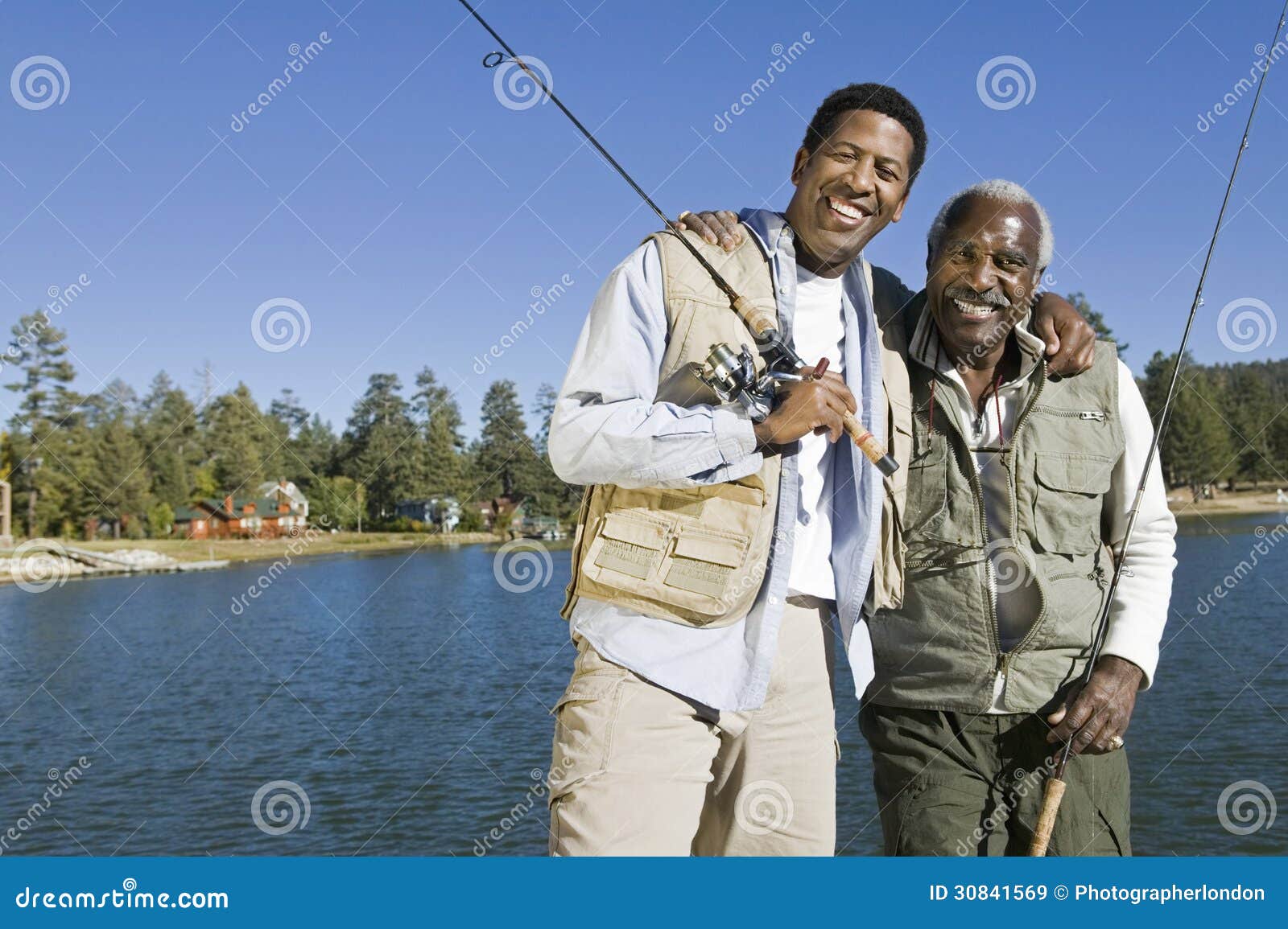 https://thumbs.dreamstime.com/z/happy-senior-man-son-fishing-rods-lake-portrait-men-adult-holding-30841569.jpg