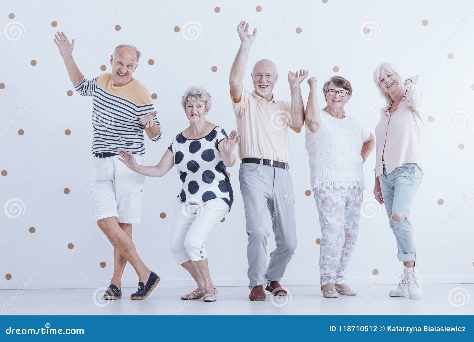 Happy Senior People Dancing Against White Background with Gold D Stock ...