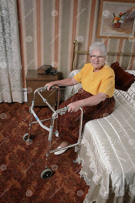 Happy senior with walker stock photo. Image of concentrate - 3056684
