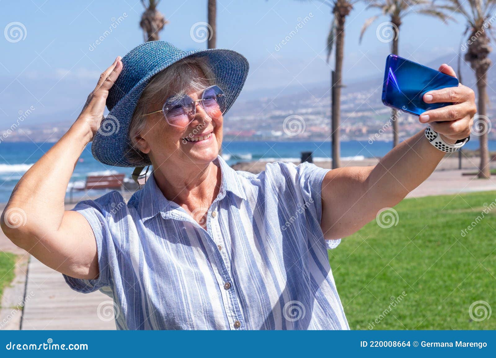 Happy Senior Woman at Sea Enjoying Summer Holidays. Handsome Influencer ...