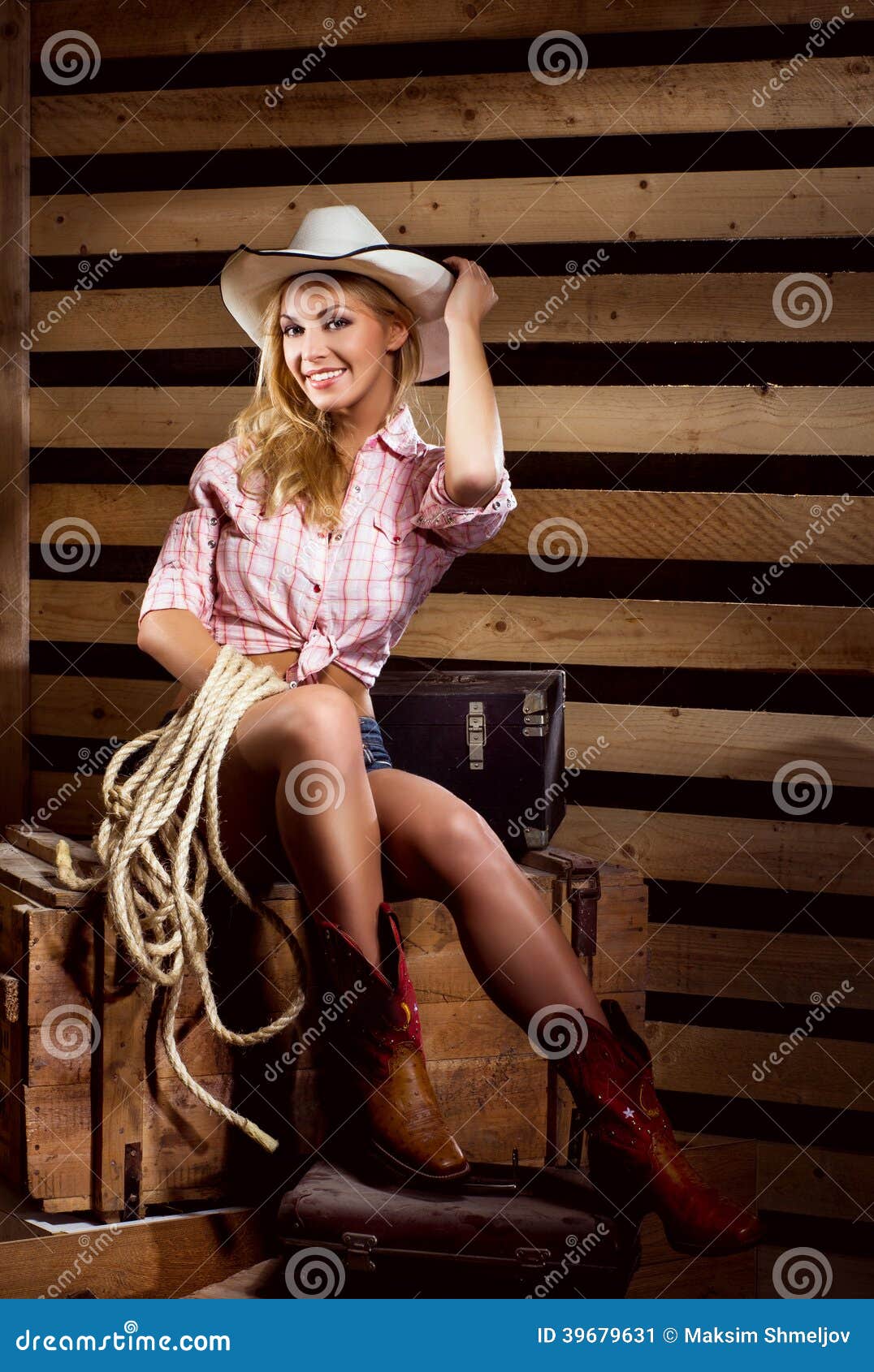 A Happy And Cowgirl In A Barn Stock Photo Image