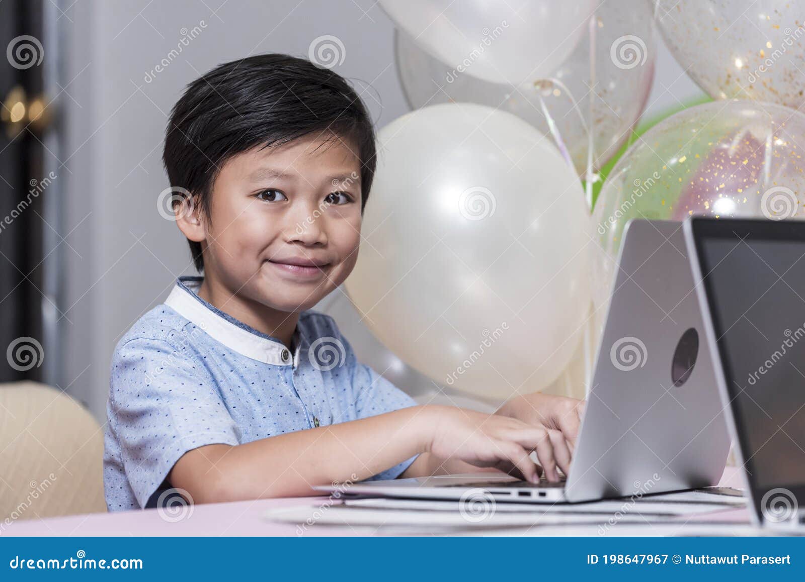 Happy Smile Asean Boy Using Laptop Computer To Study Online E ...