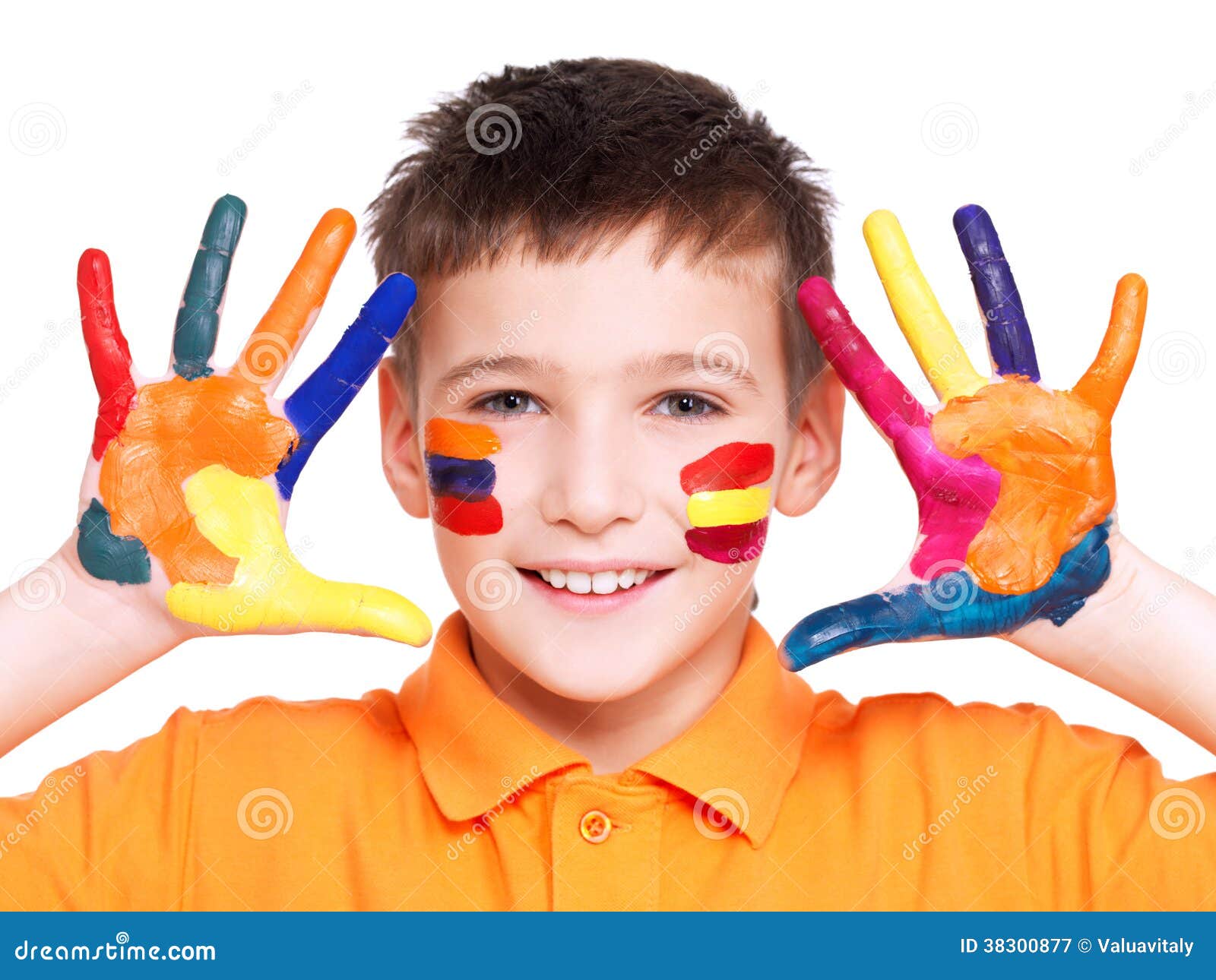 Happy smiling boy with a painted hands and face. Happy smiling boy with a painted hands and face in orange t-shirt - on a white background.