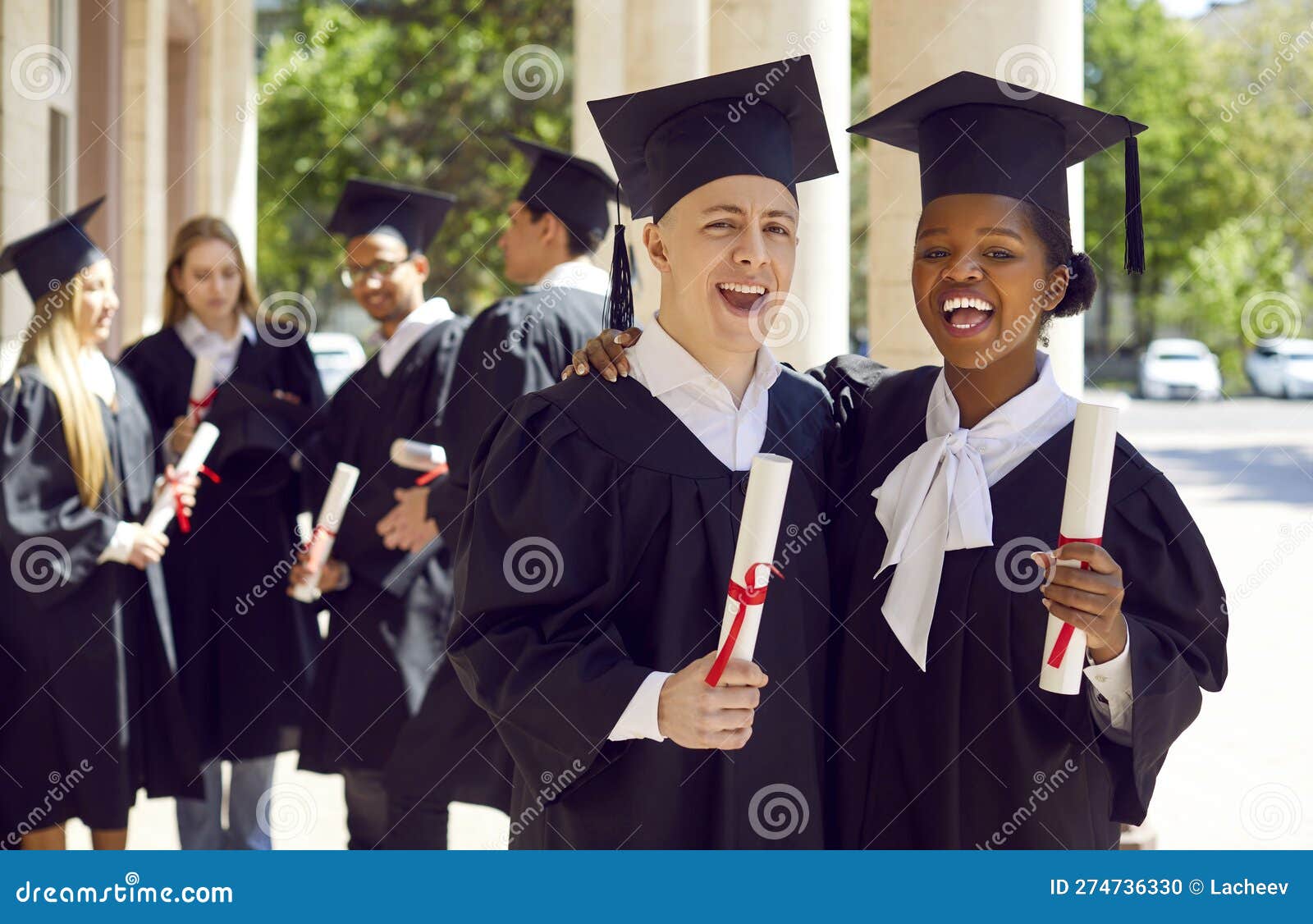 Premium Photo | Young afro american female student dressed in black graduation  gown. girl posing for a photo and holding a flowers