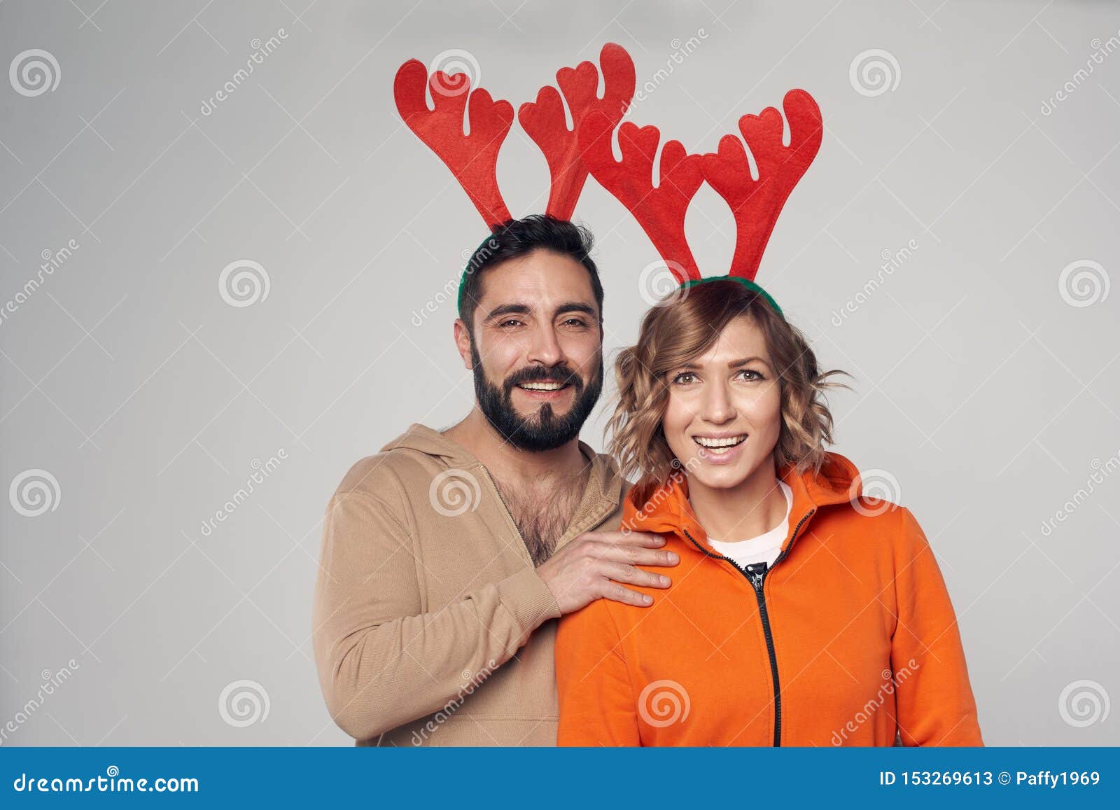 Happy Smiling Couple Wearing Christmas Deer Costumes Smiling Stock ...