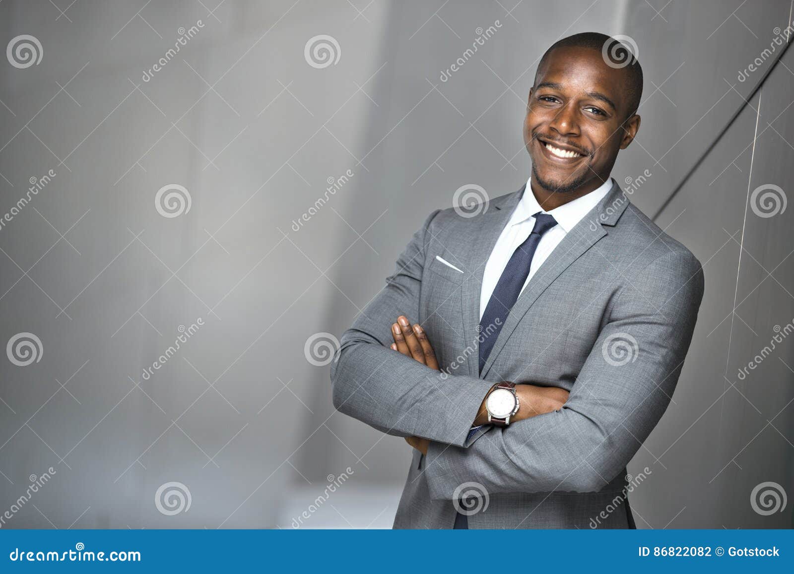 happy smiling portrait of a successful confident african american corporate executive business man