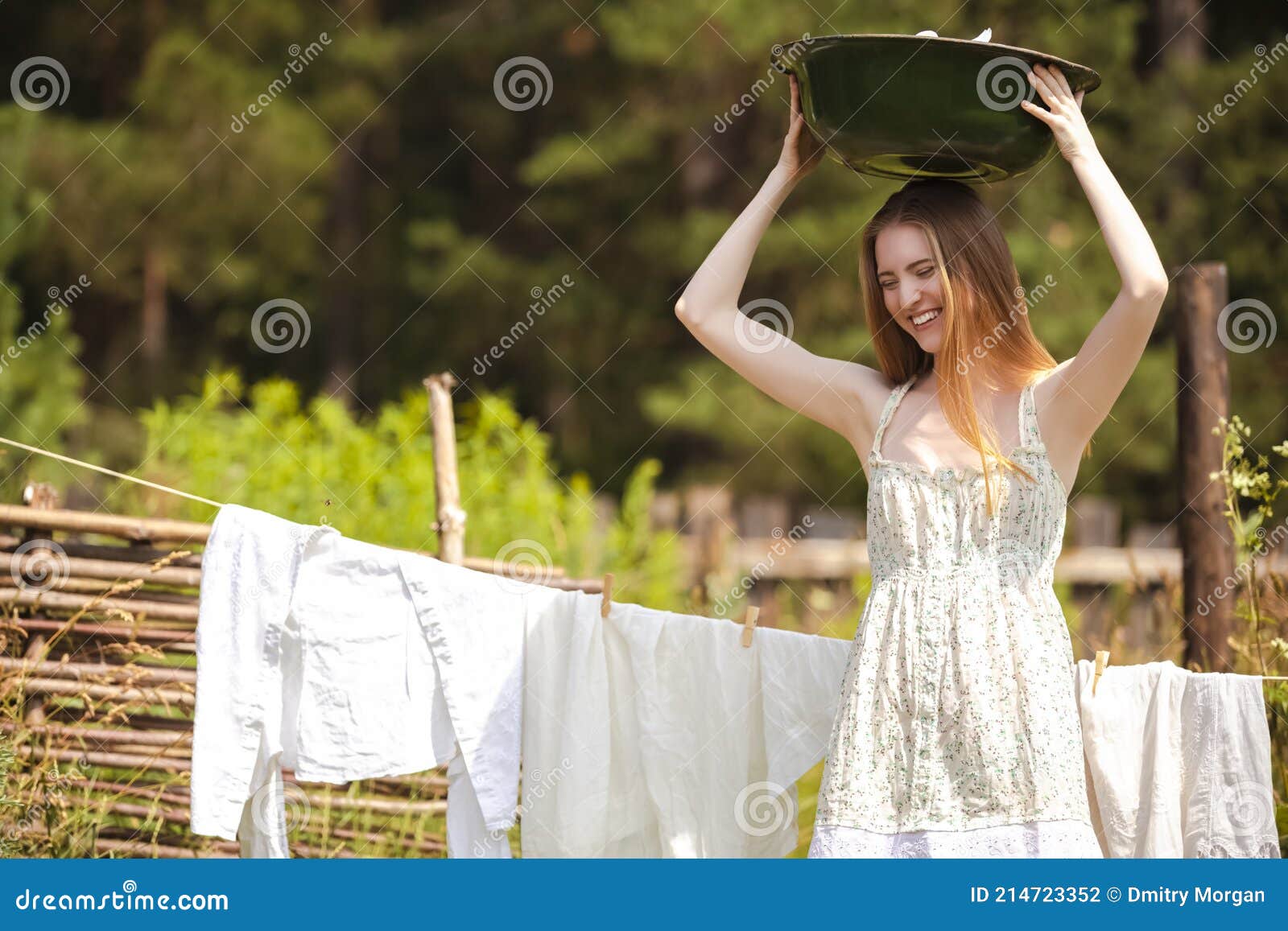 Happy Smiling Redhaired Caucasian Girl Posing with Basin of Laundry ...