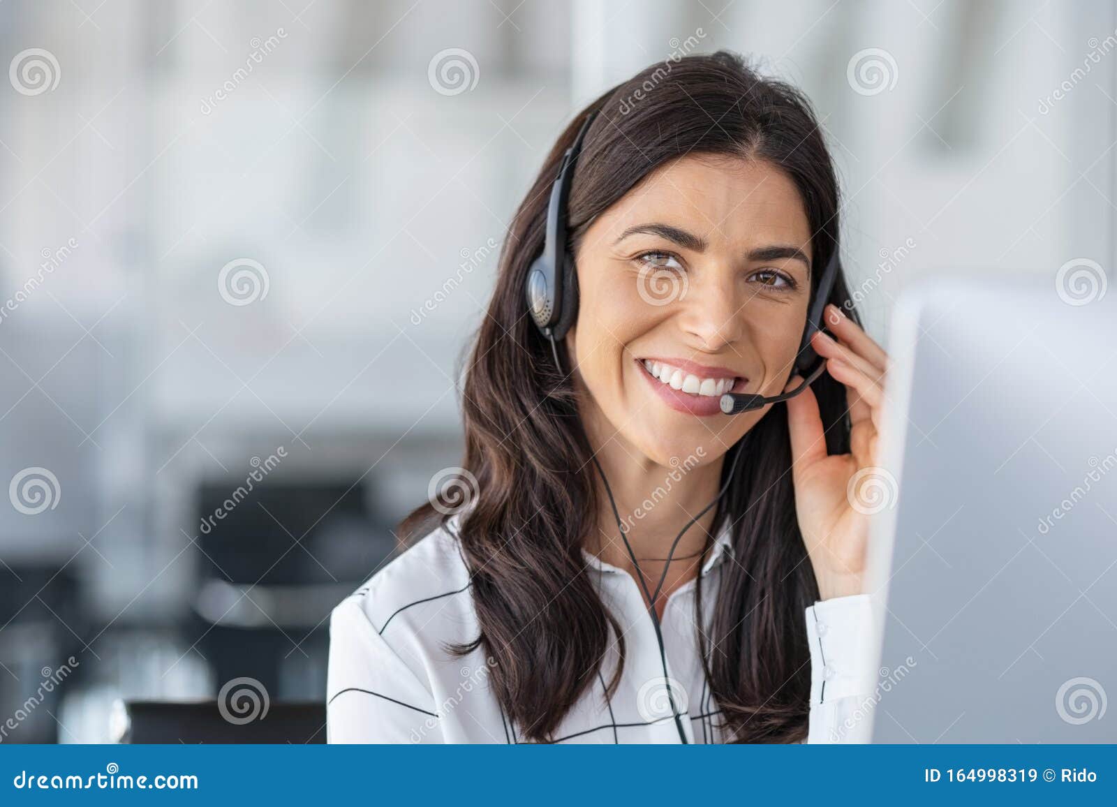 happy smiling woman working in call center