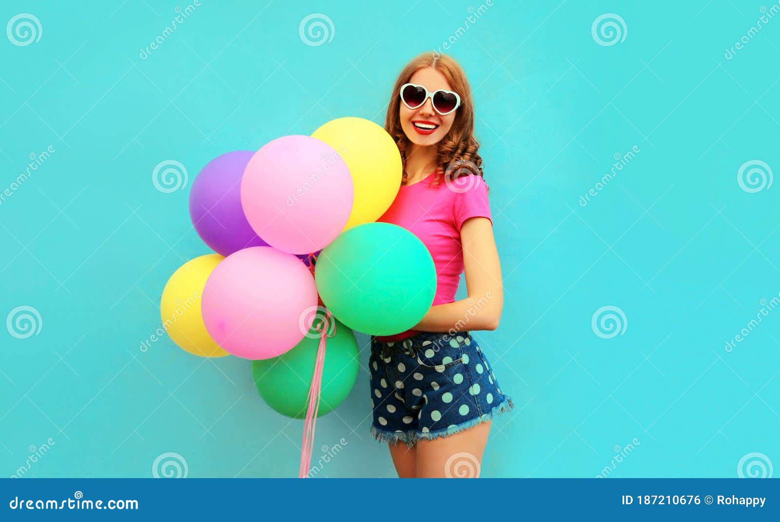 Happy Smiling Young Woman with Bunch of Balloons Having Fun Wearing a ...